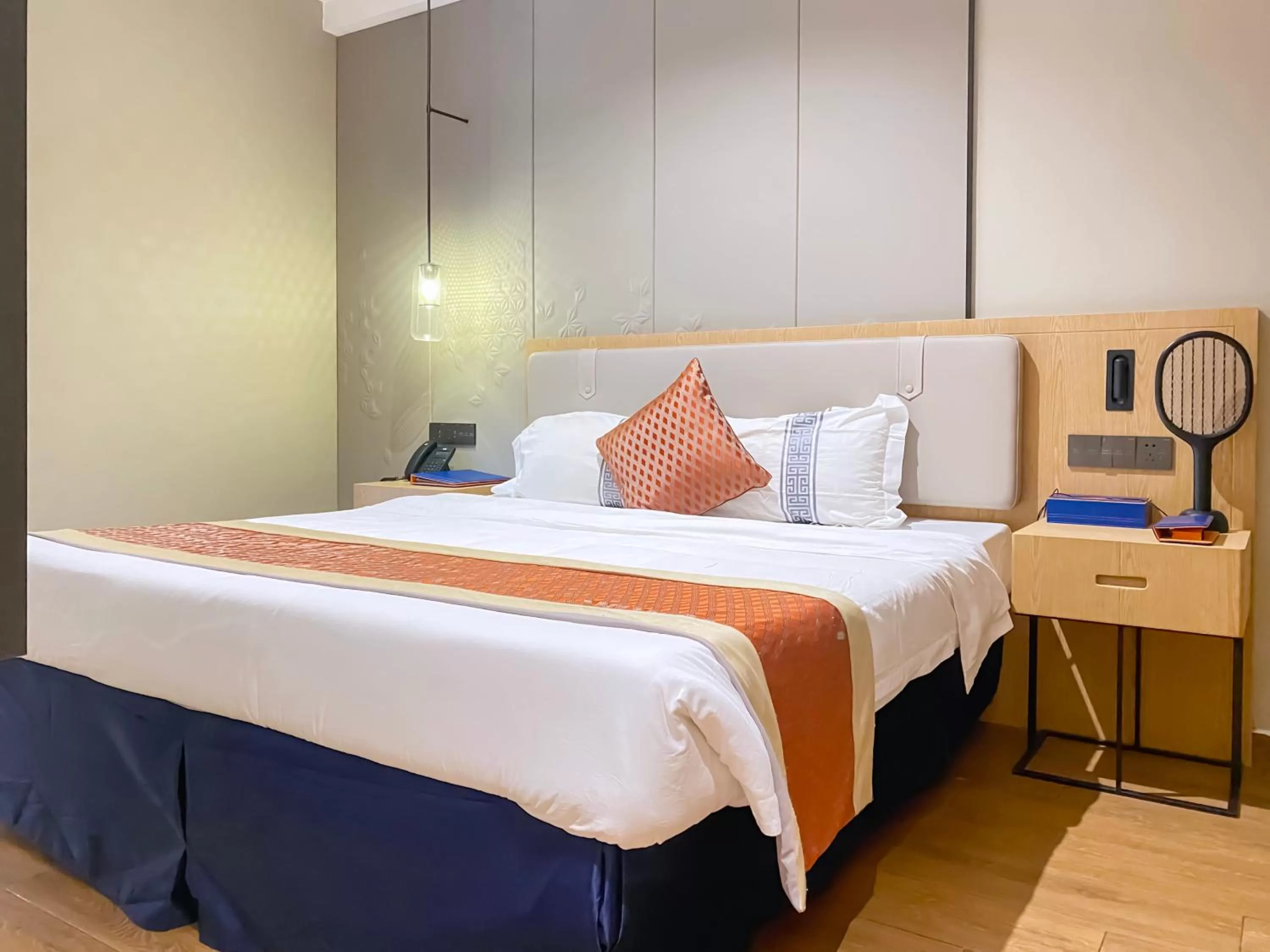 Bedroom in Hôtel FAMILLE MONDIALE