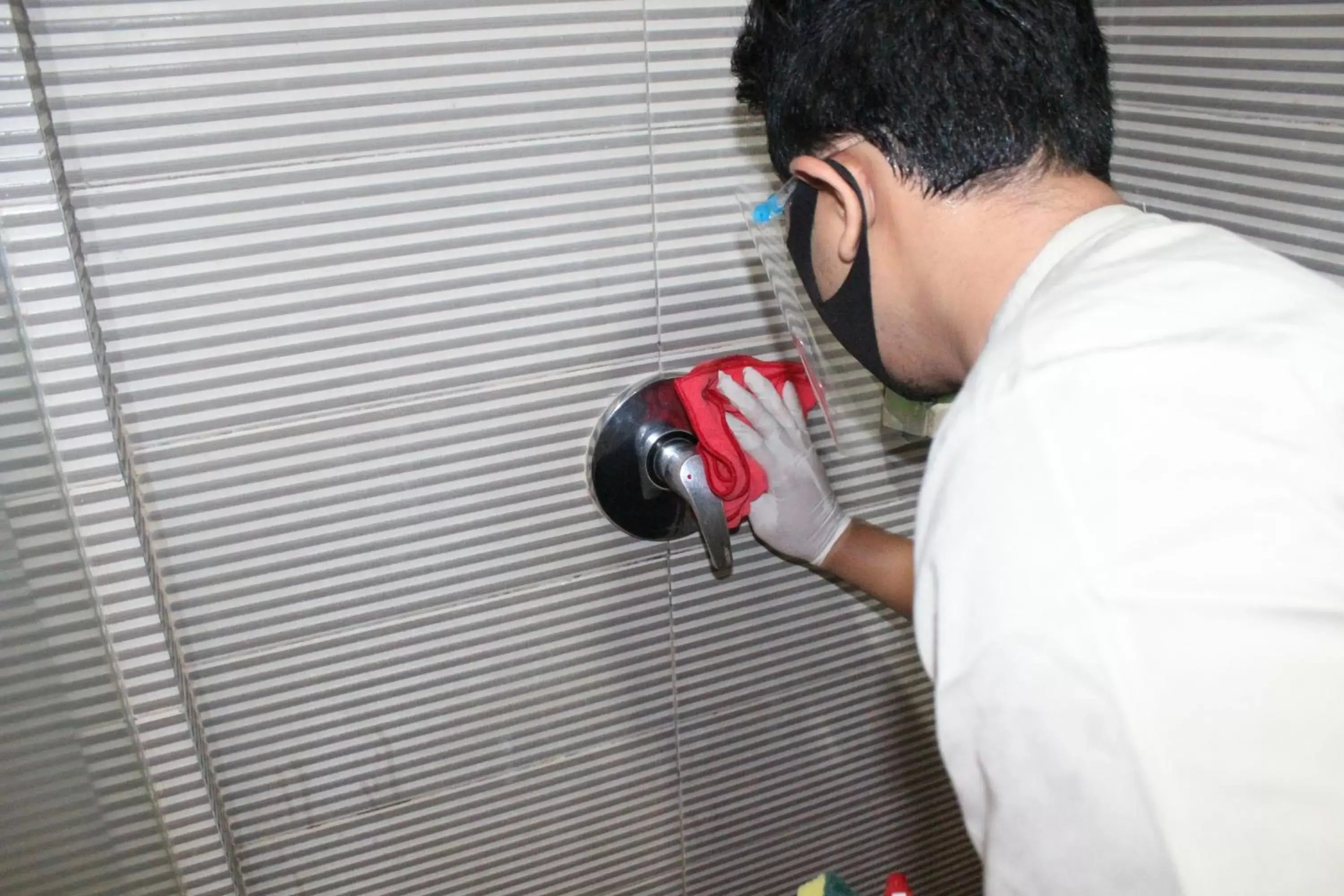 Bathroom in 100 Sunset Kuta Hotel & Ballroom Bathroom in 100 Sunset Kuta Hotel & Ballroom