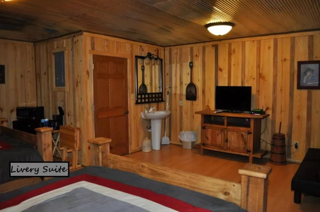 Seating area, TV/Entertainment Center in Diamonds Old West