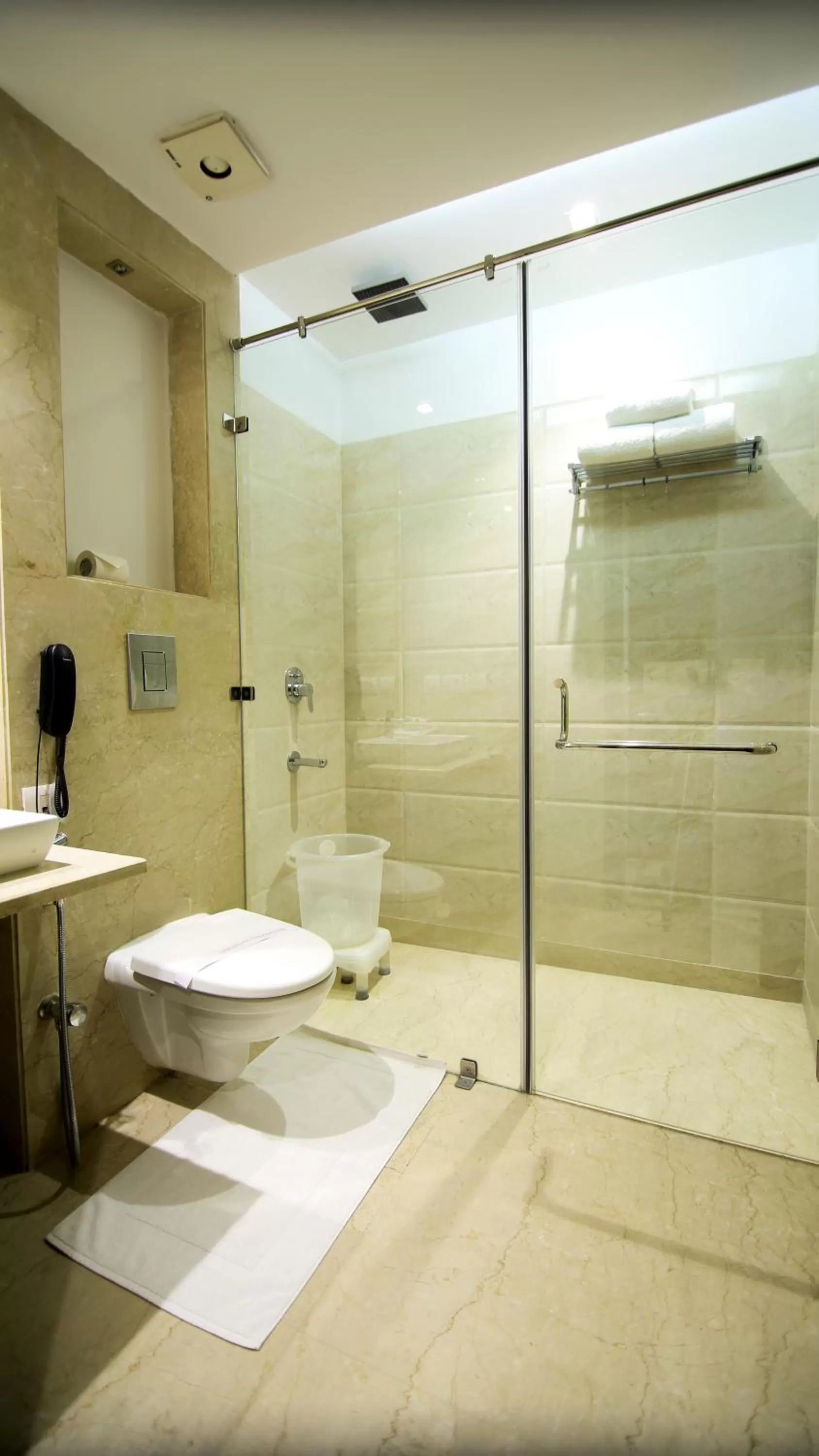 Bathroom in Hotel The Prime Balaji Deluxe, City Centre, With Free Airport Pickup