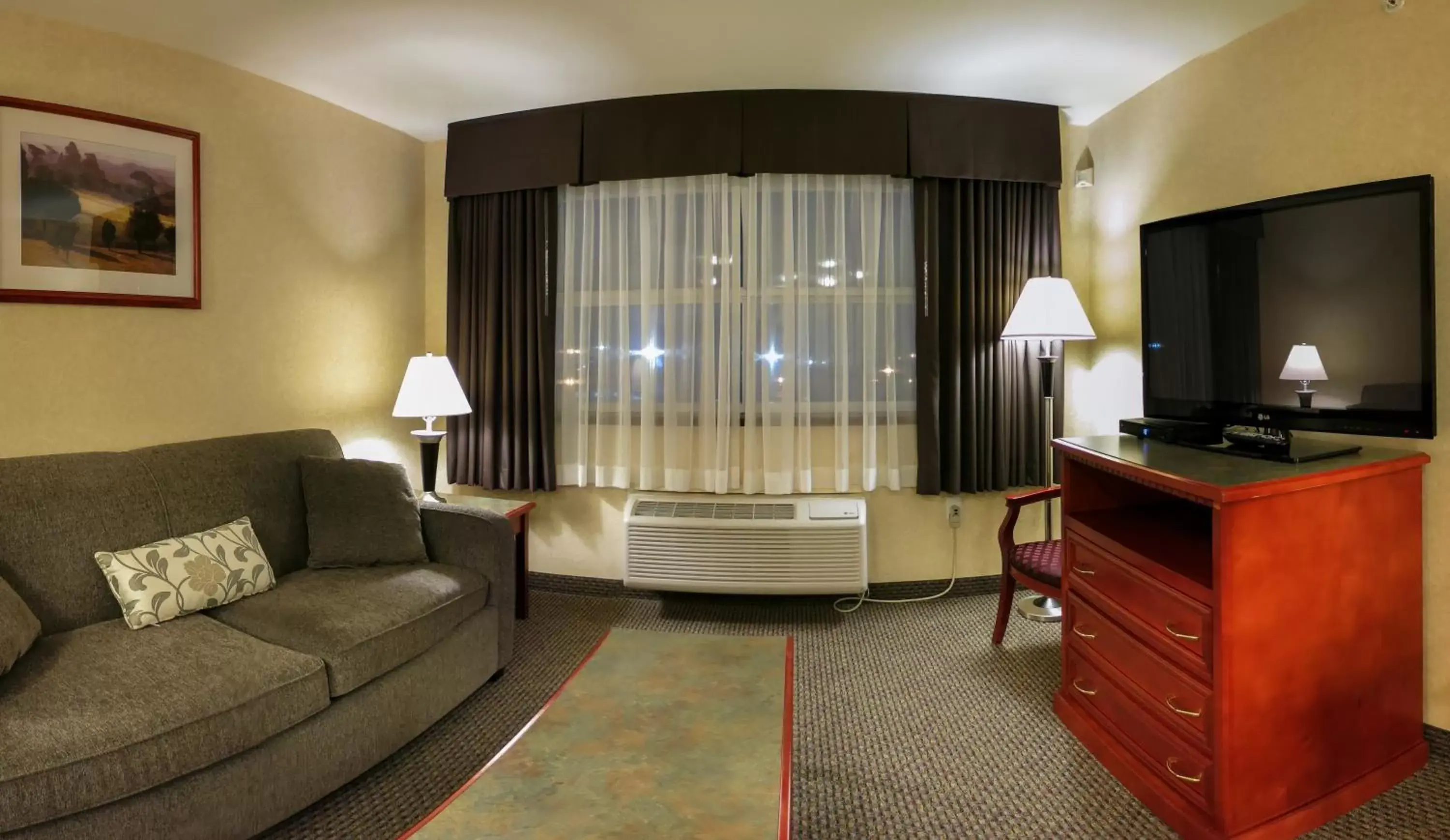TV and multimedia, Seating Area in Days Inn & Suites by Wyndham Langley