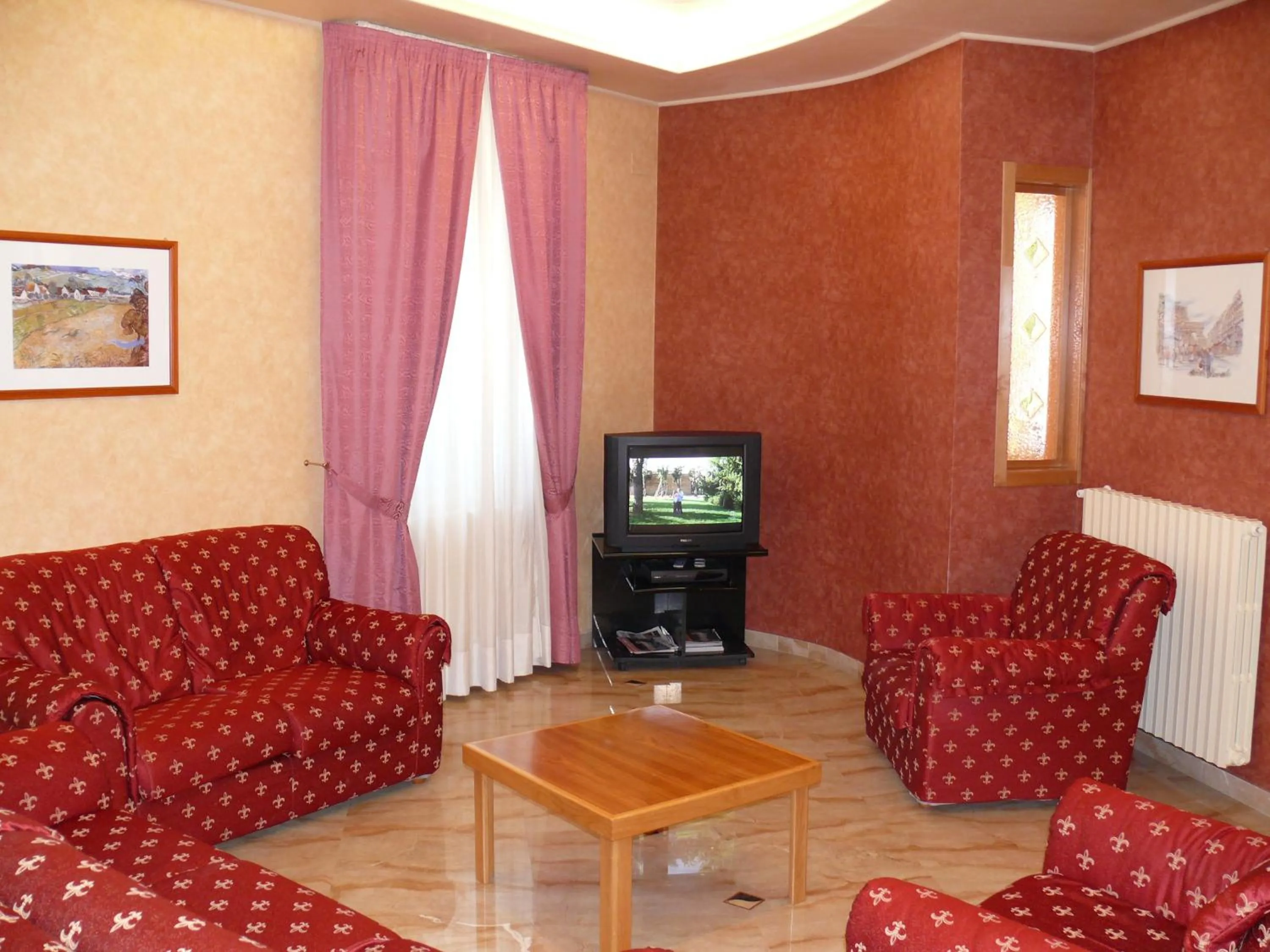 Living room in Albergo Casa Del Pellegrino