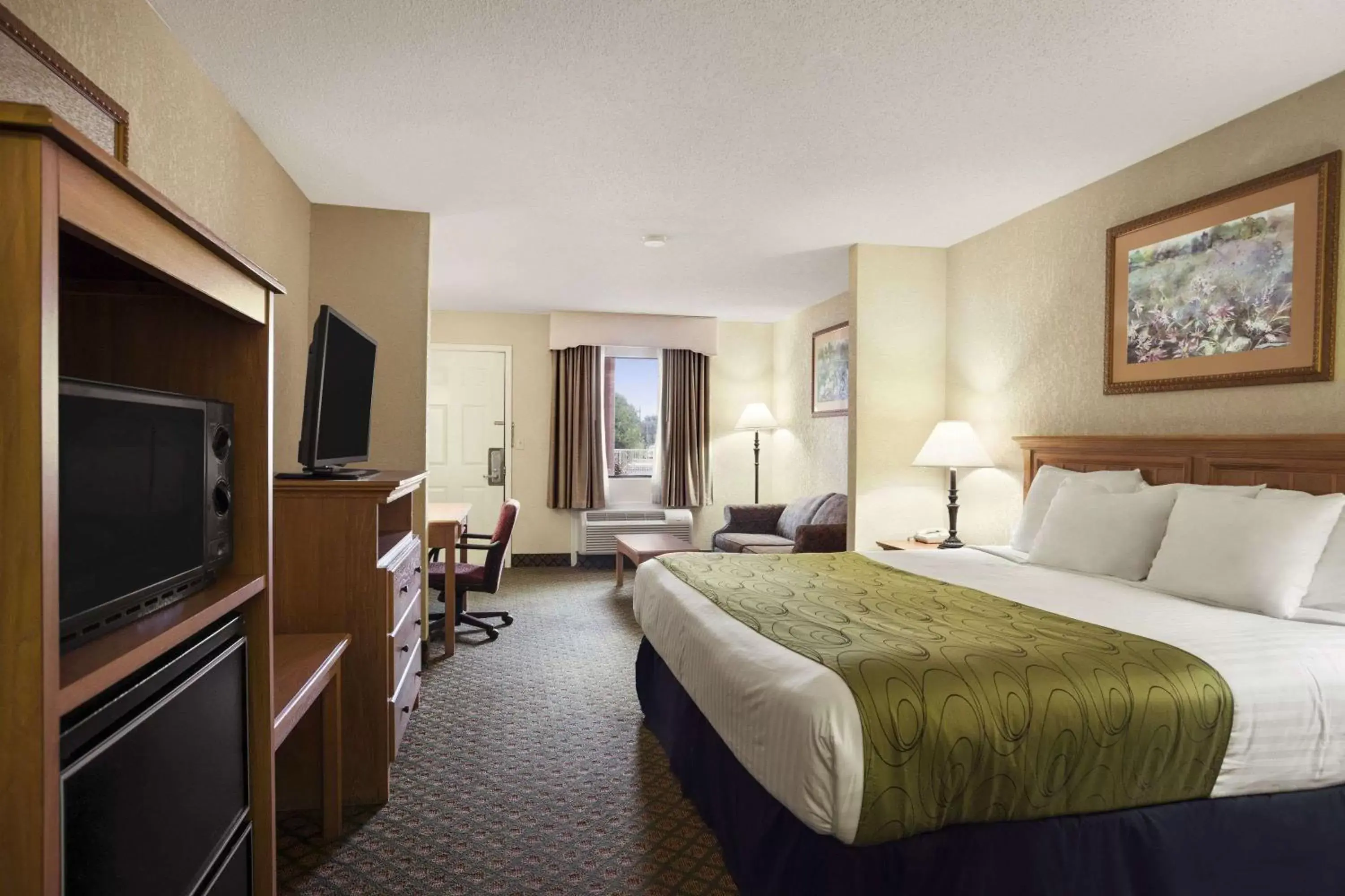 Photo of the whole room, TV/Entertainment Center in Days Inn & Suites by Wyndham Stuttgart
