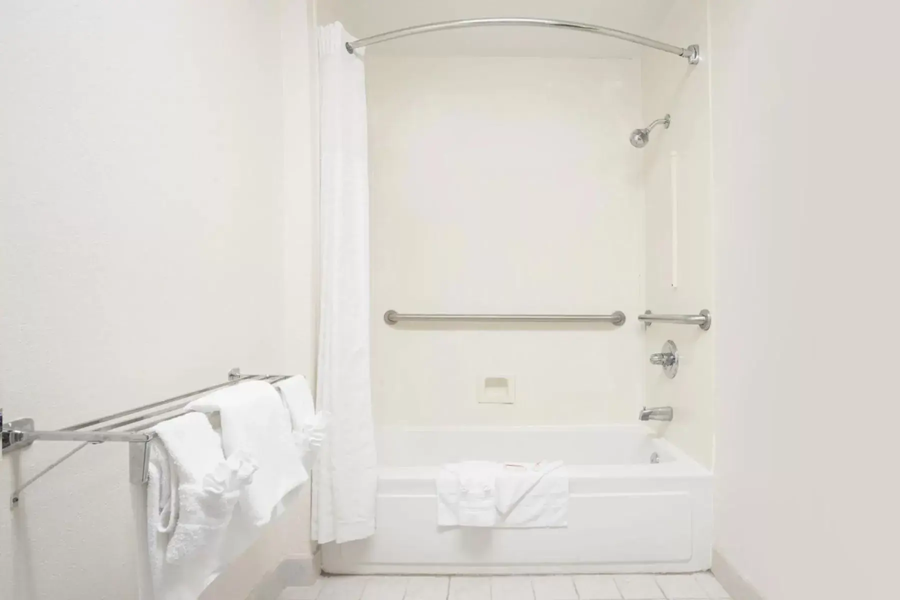 Bathroom in SureStay Hotel by Best Western North Myrtle Beach