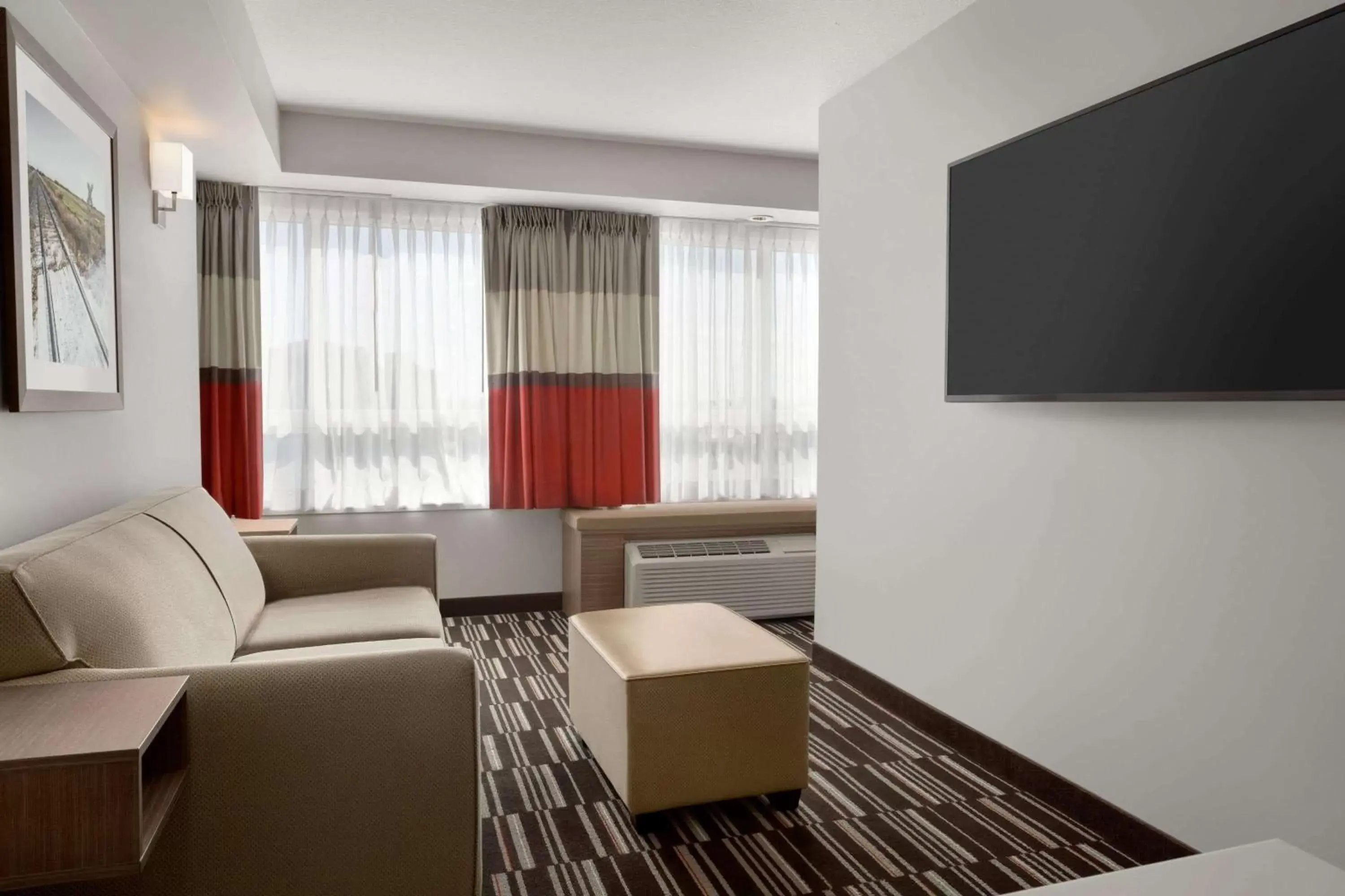 Photo of the whole room, TV/Entertainment Center in Microtel Inn & Suites by Wyndham Bonnyville