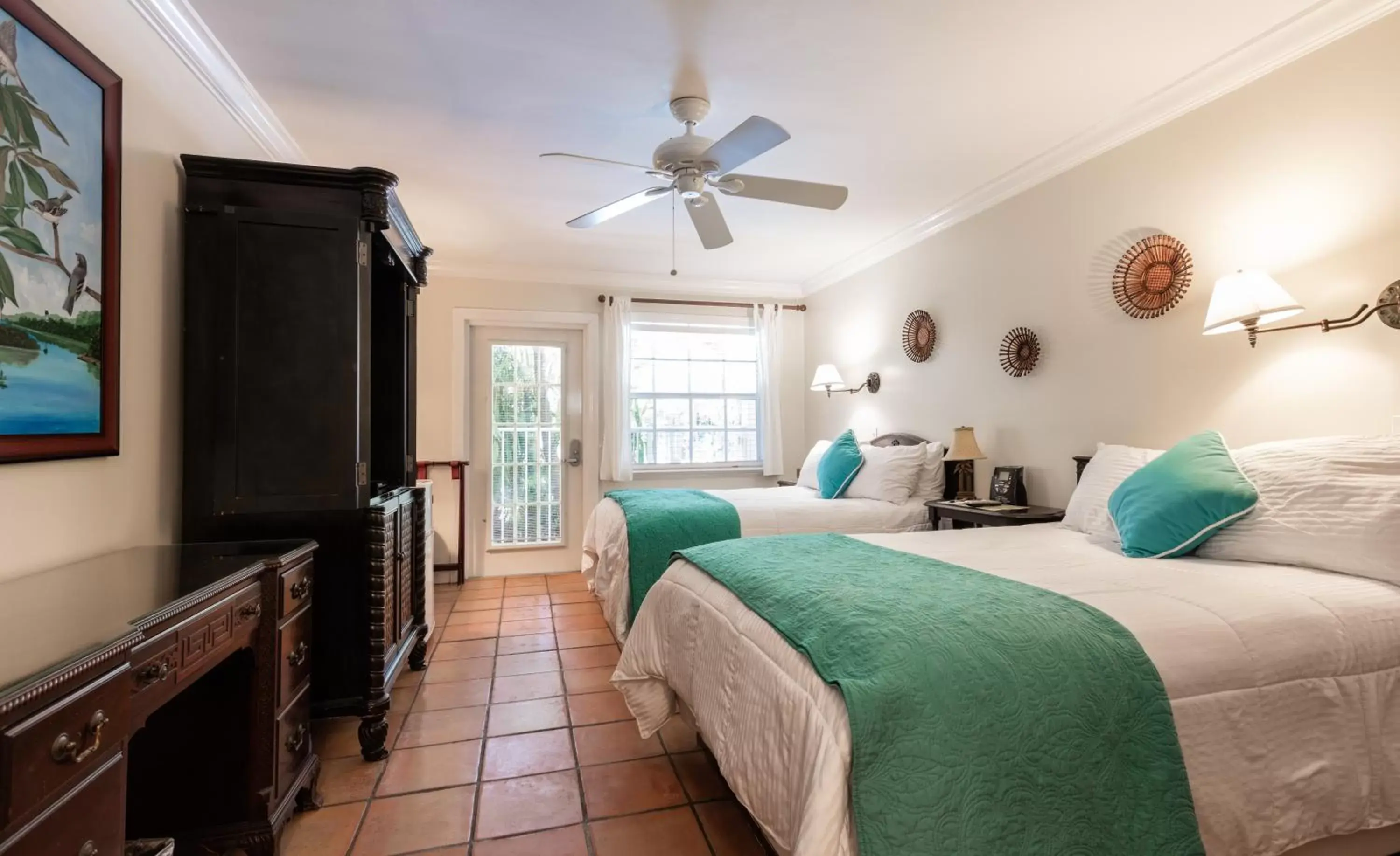 Bedroom, Bed in The Caribbean Court Boutique Hotel