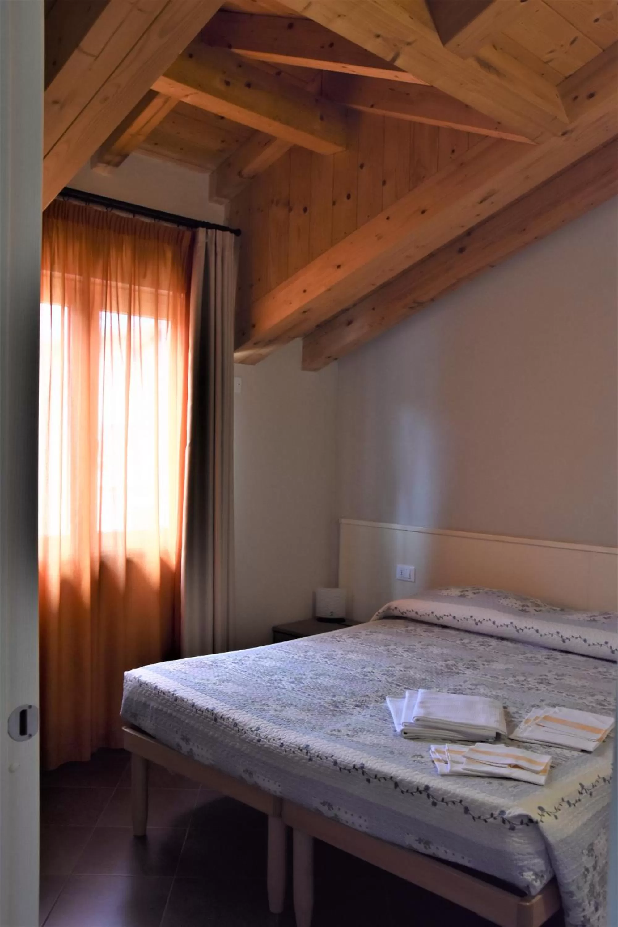 Bed in Le Vele Residence