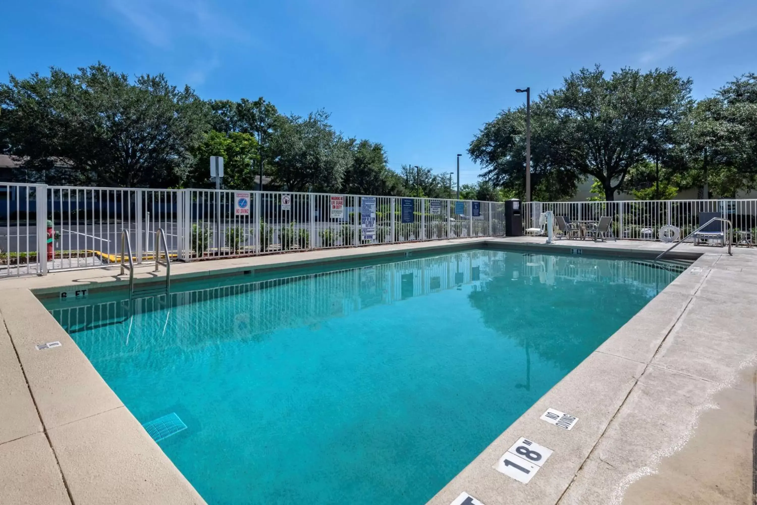 Pool view, Swimming Pool in Best Western Plus Orlando East - UCF Area