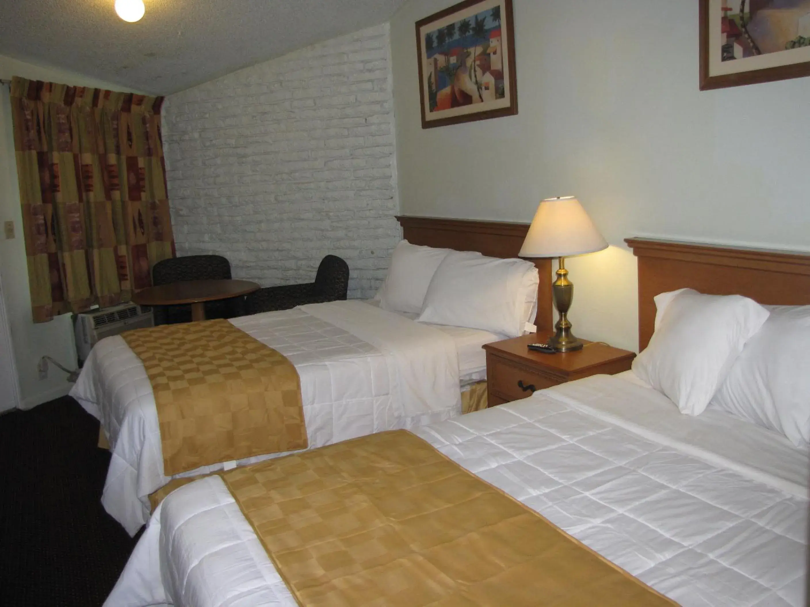 Photo of the whole room, Bed in A-1 Budget Motel