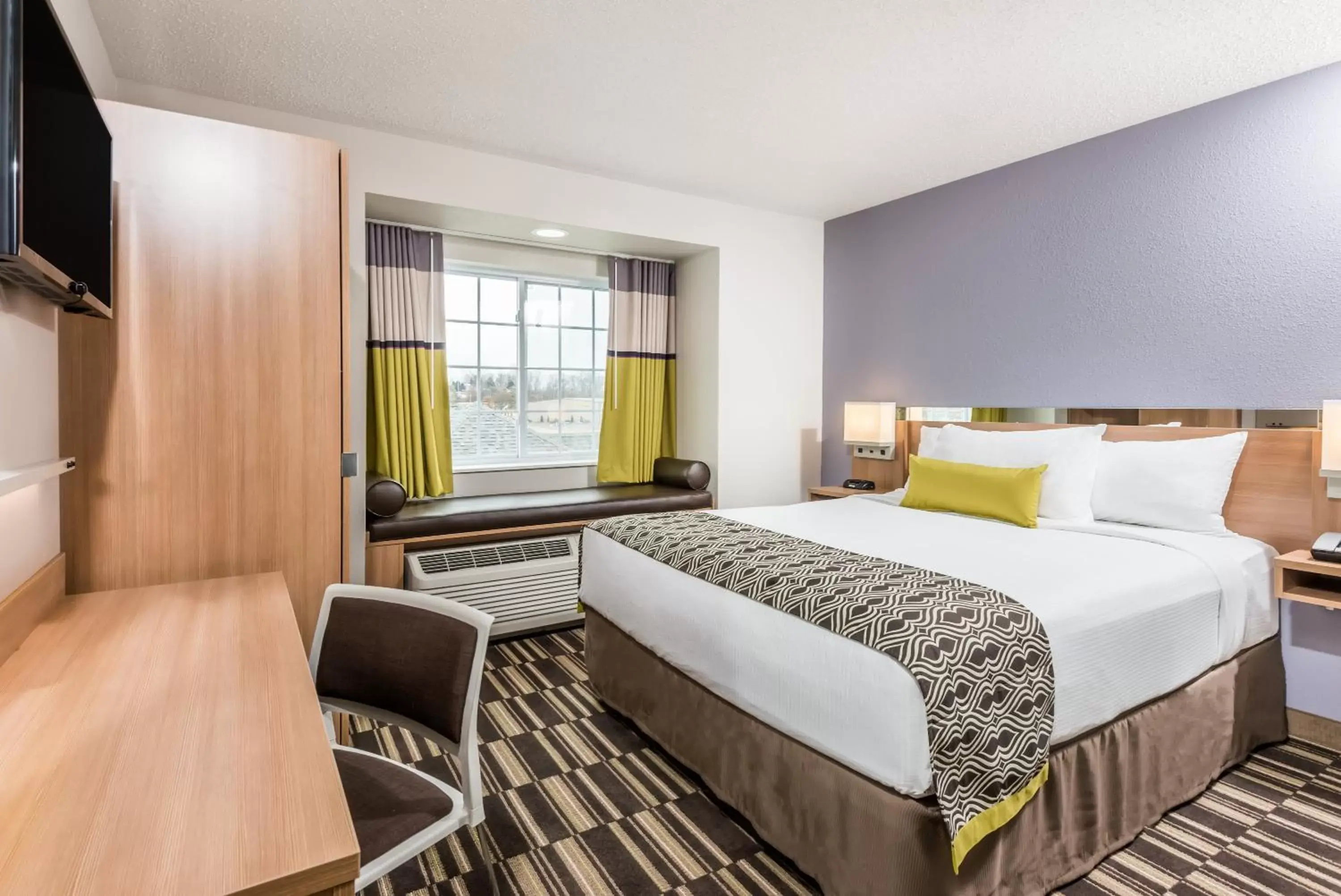 Bed in Microtel Inn & Suites by Wyndham Beaver Falls