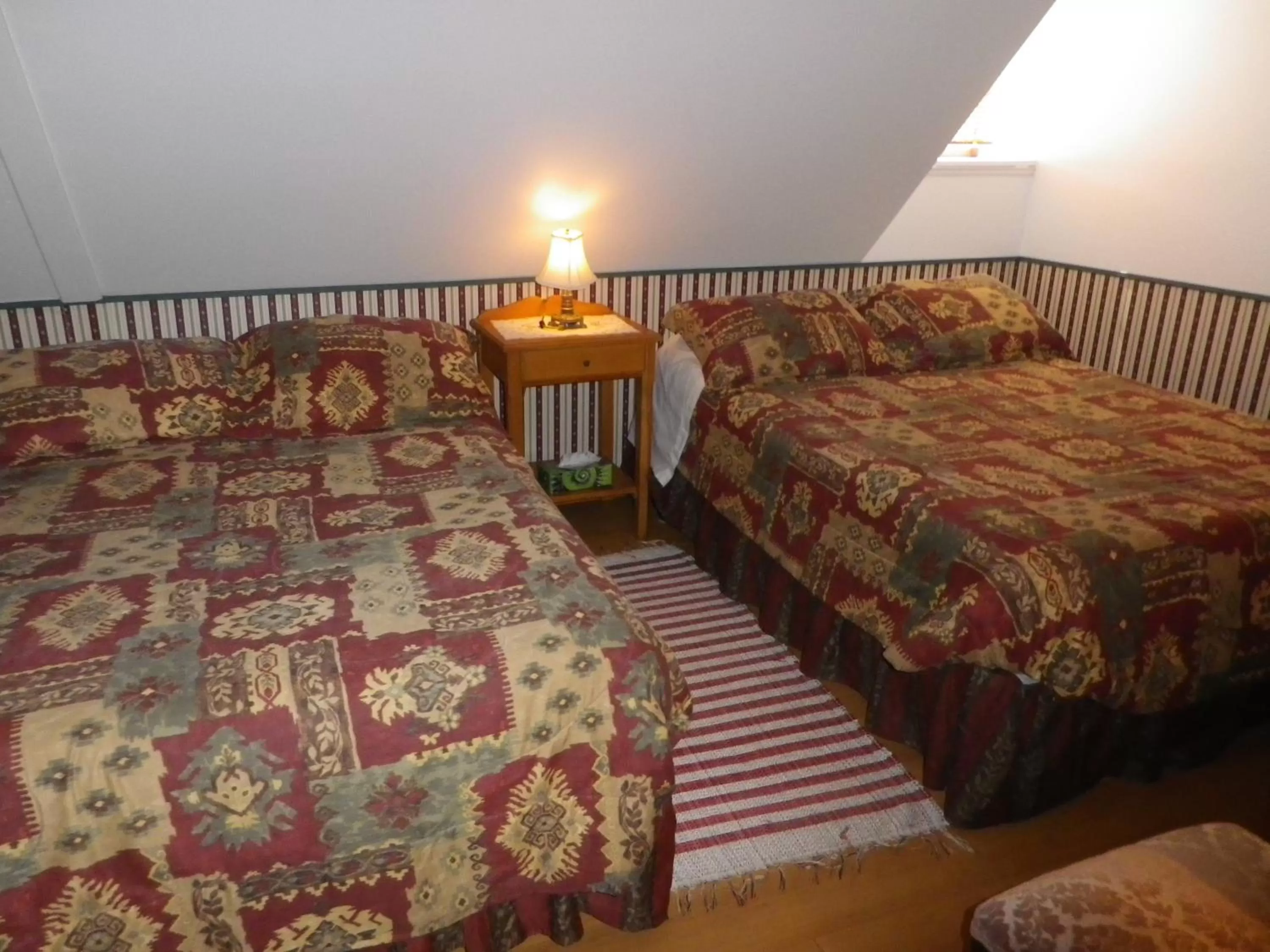 Bed in Auberge La Seigneurie Valcartier