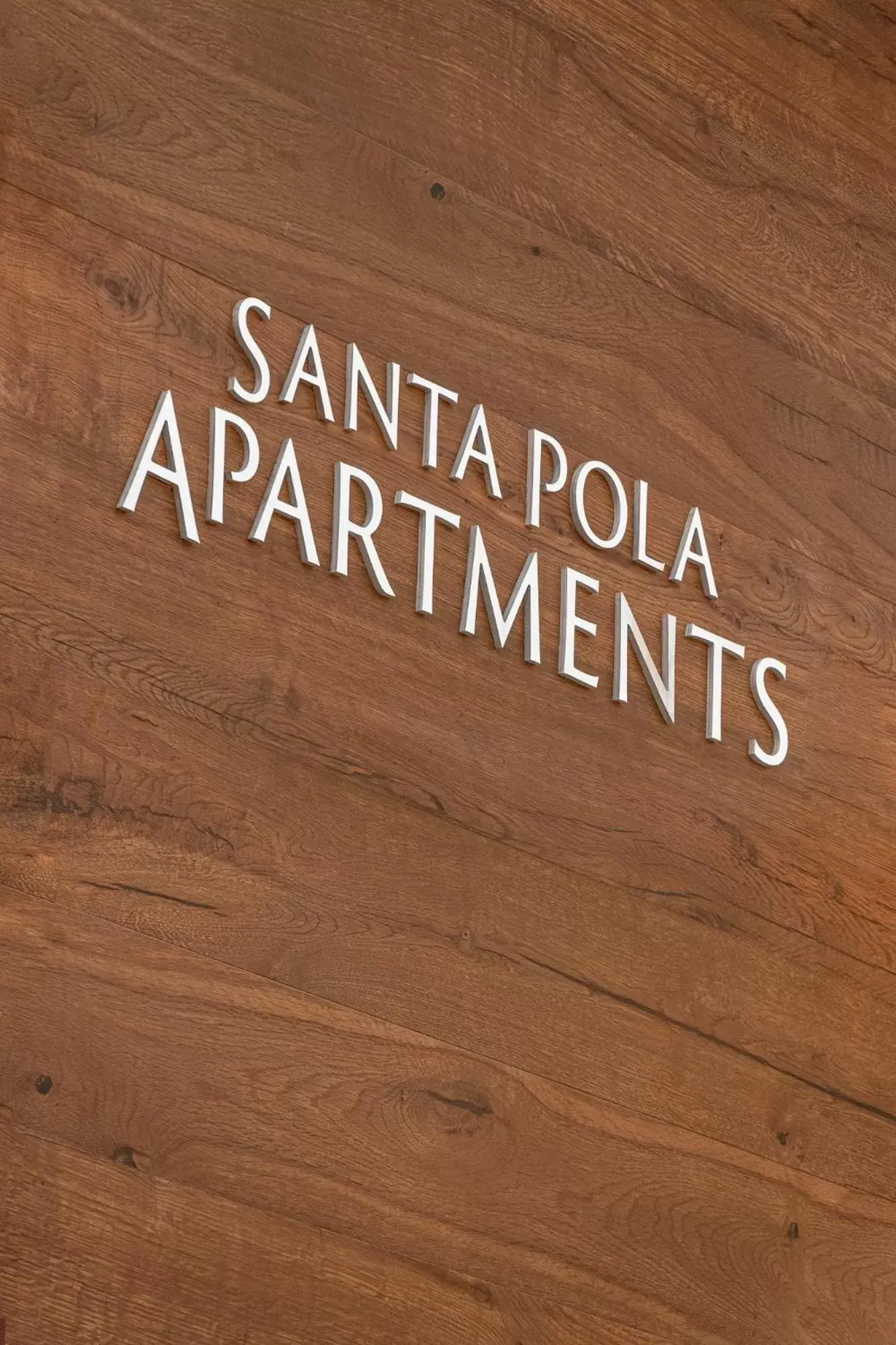 Property logo or sign in Santa Pola Apartments