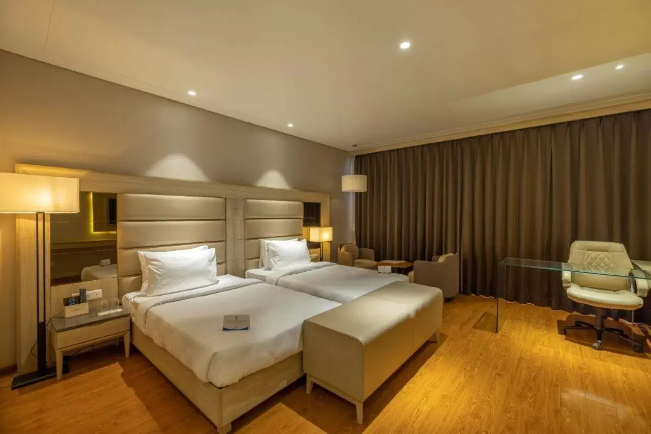 Bedroom, Bed in Sarovar Portico Morbi