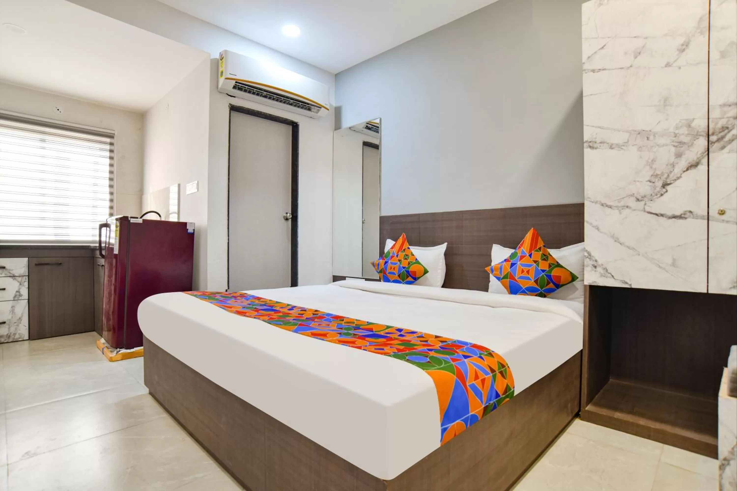 Photo of the whole room, Bed in Fabhotel Grand Blue