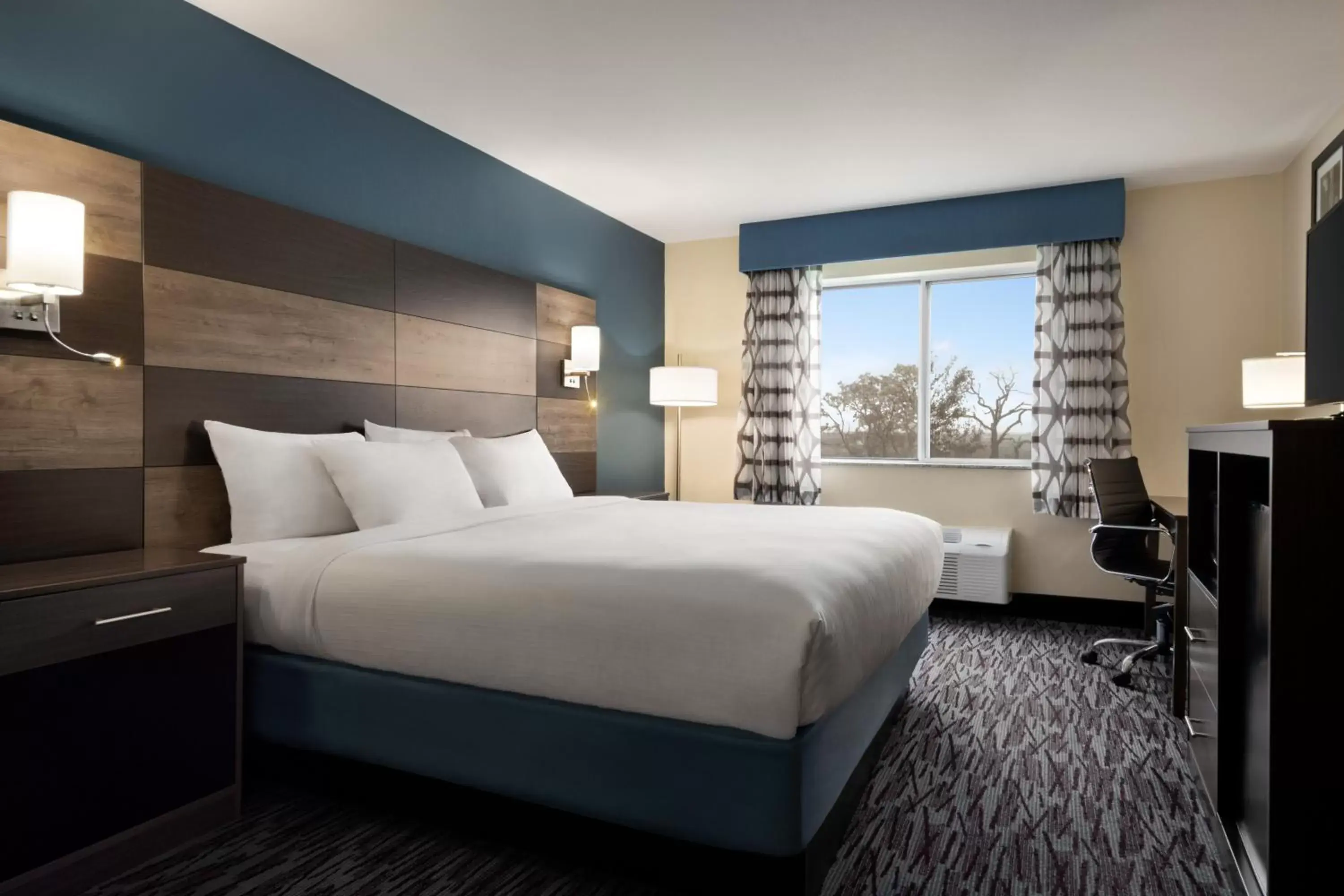 Guests, Bed in AmericInn by Wyndham Dodgeville