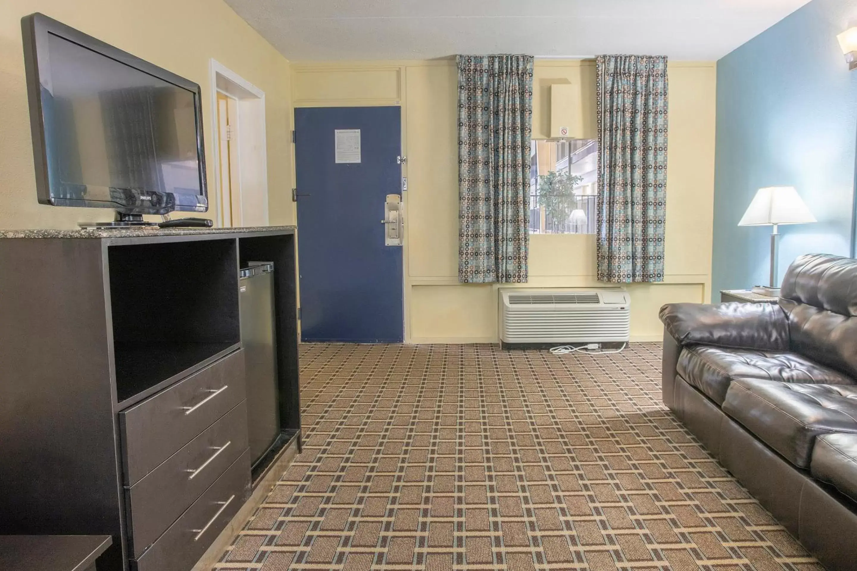 Bedroom, TV/Entertainment Center in OYO Hotel Knoxville TN Cedar Bluff I-40