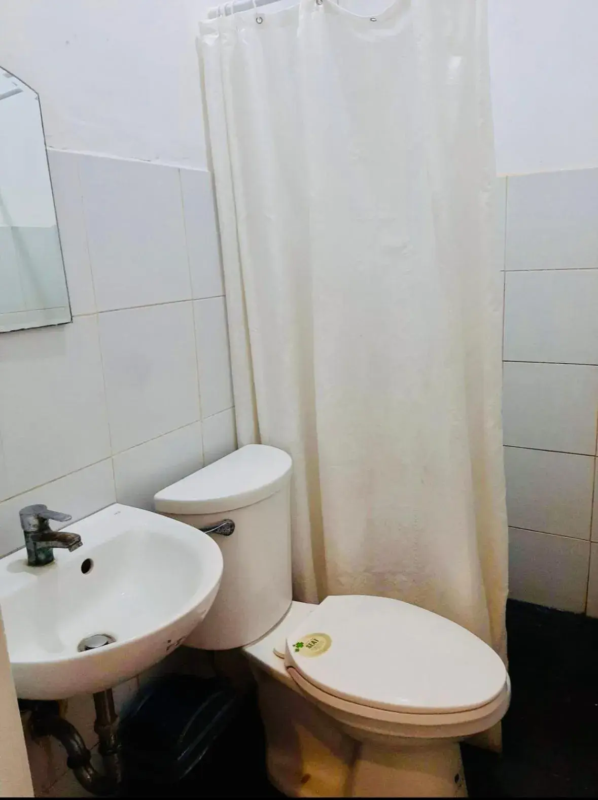 Bathroom in Hometown Hotel Bacolod