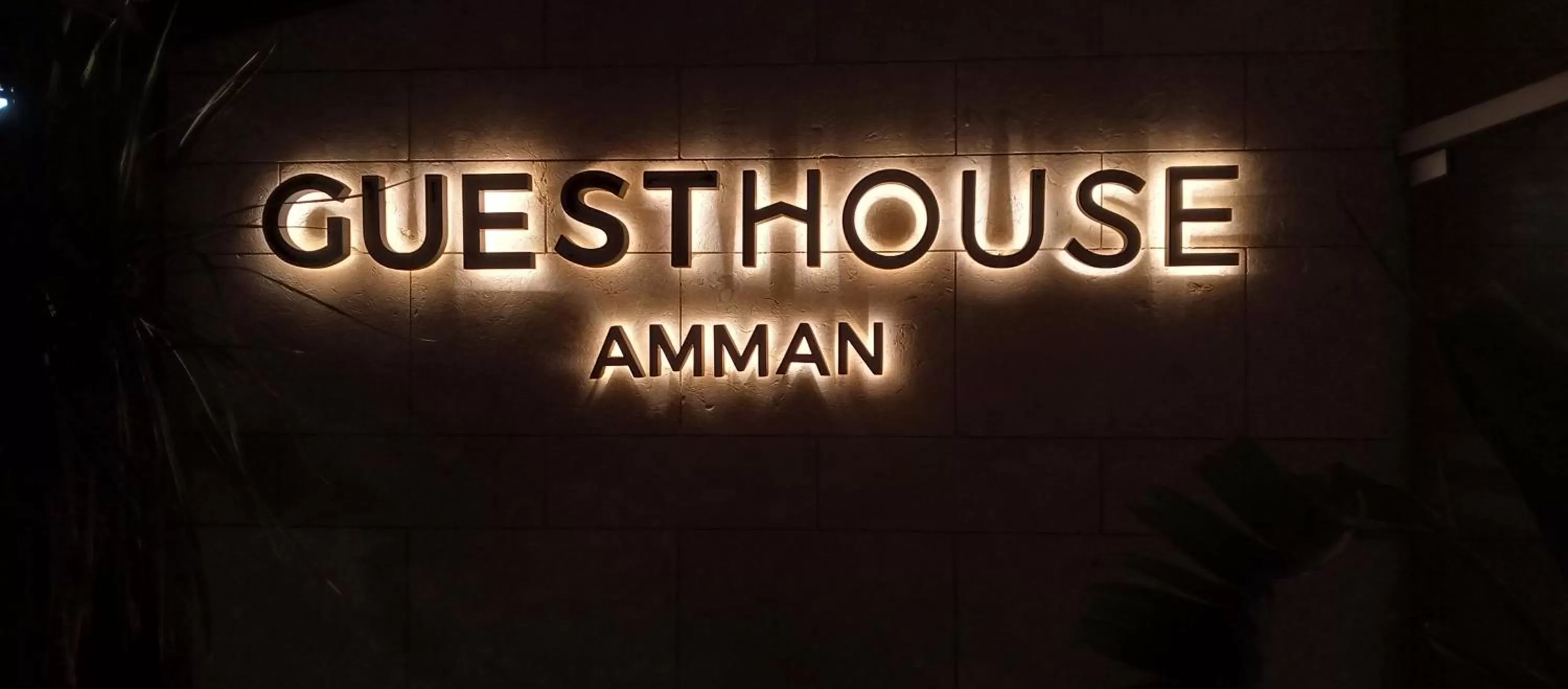 Property logo or sign in Guest House Hotel Amman by FHM