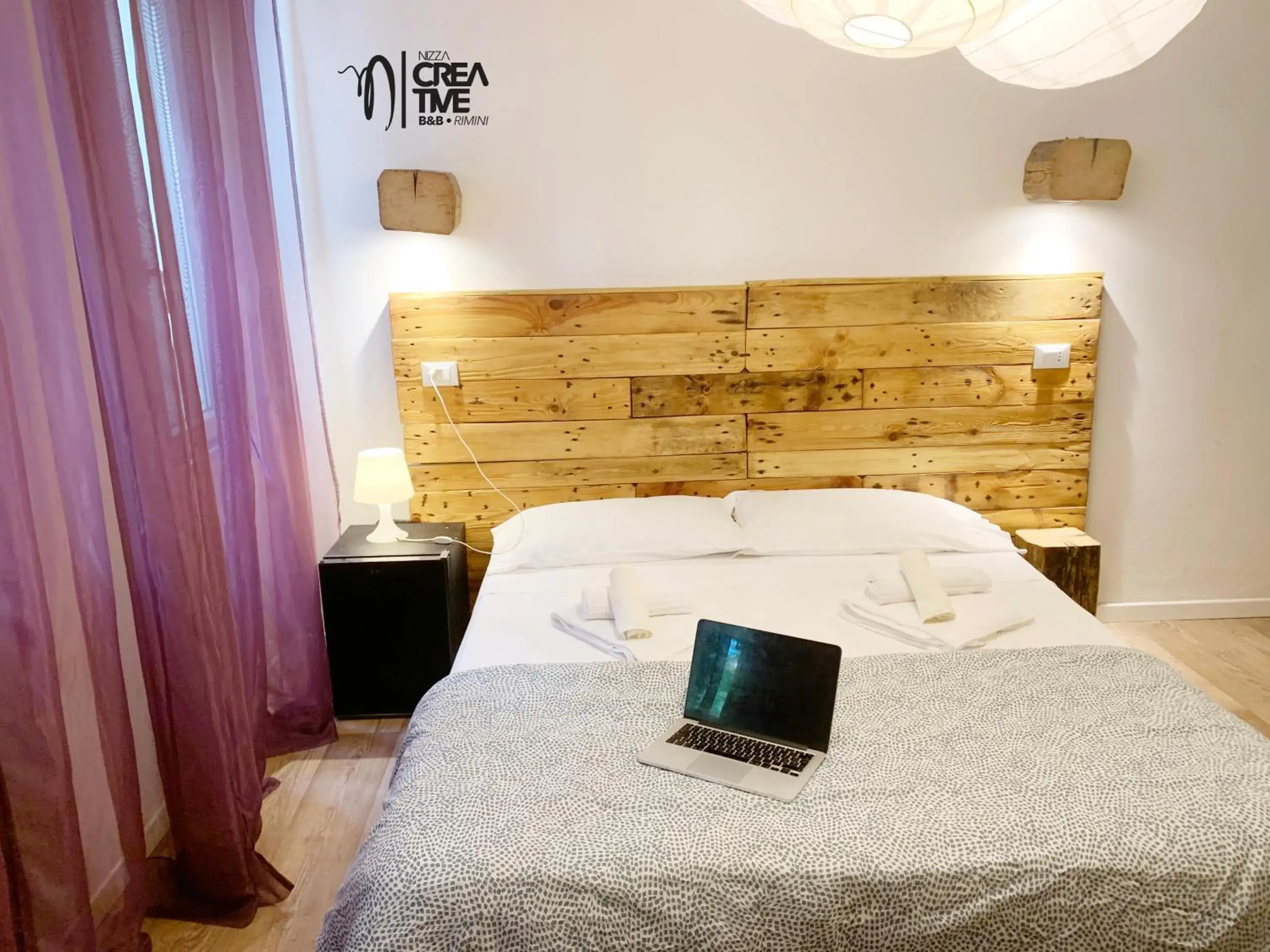 Bed in Hotel Nizza Creative Hotel