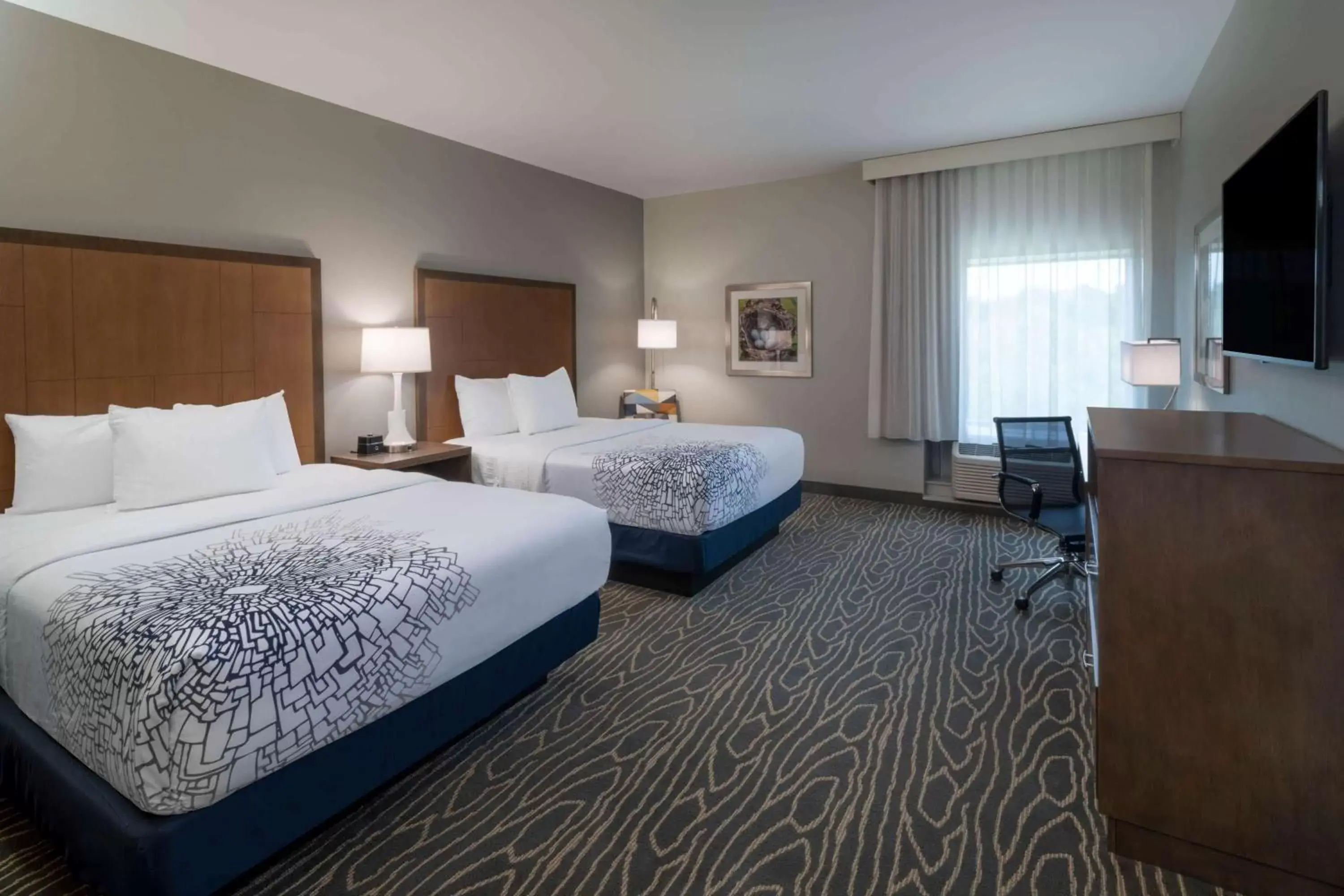 Photo of the whole room, Bed in La Quinta Inn & Suites by Wyndham Tifton