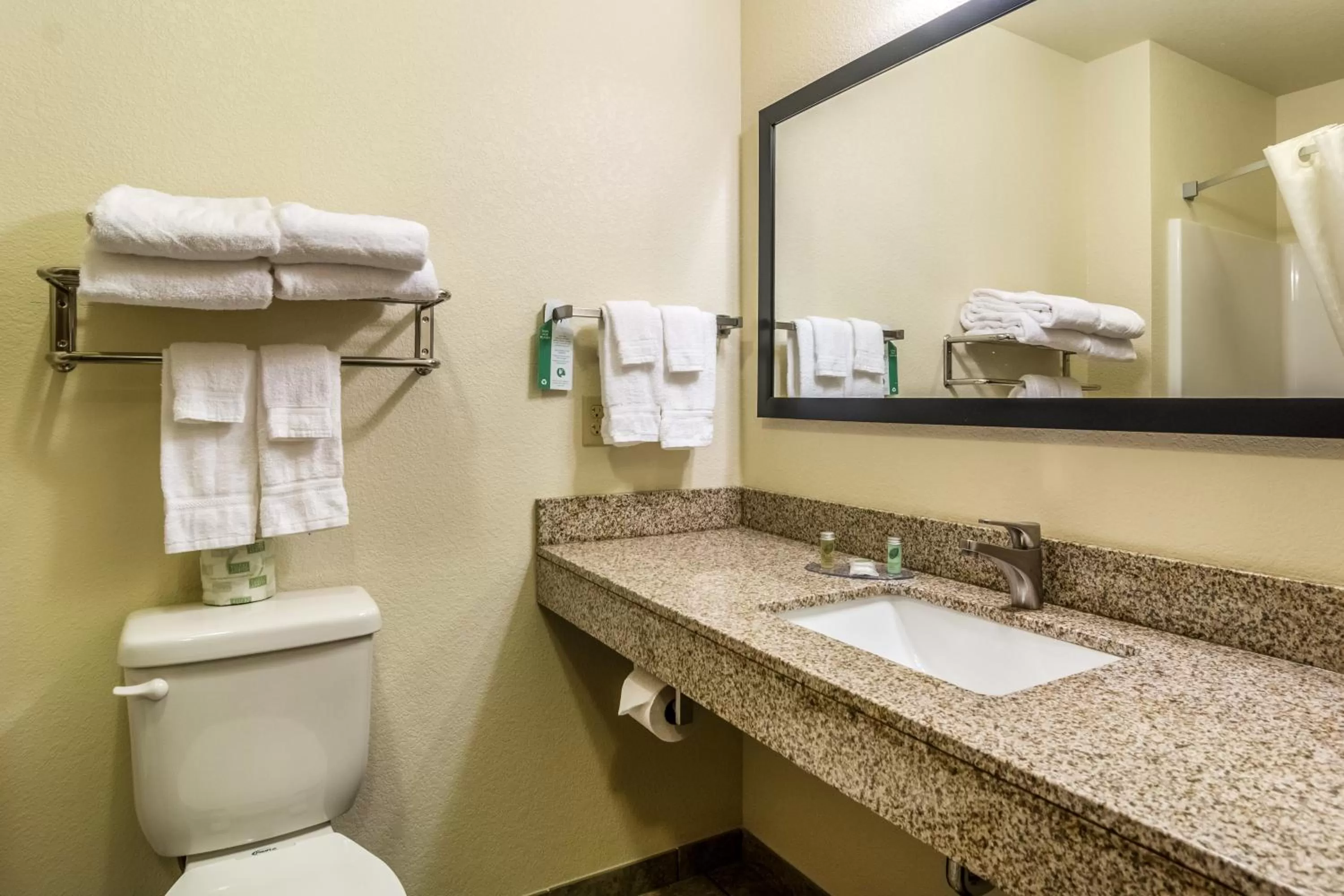 Toilet in Cobblestone Hotel & Suites - Torrington