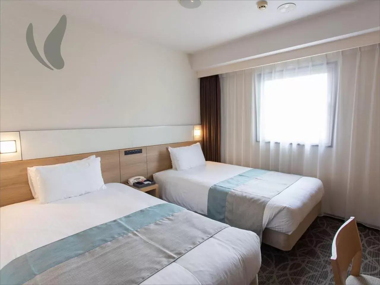 Bed in Hotel Hokke Club Naha Shintoshin