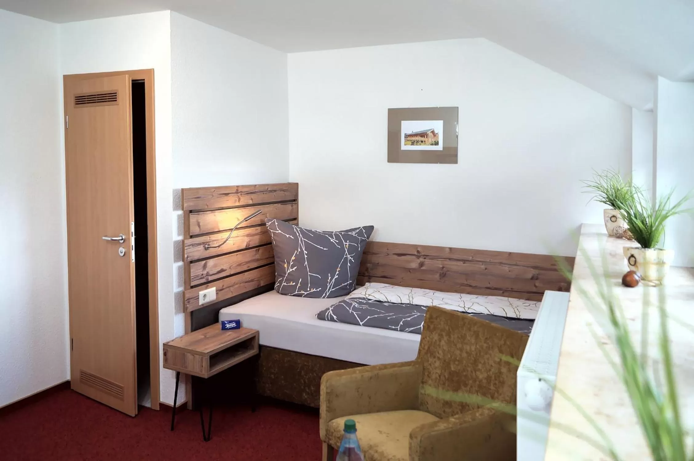 Bed in Erzgebirgshotel Misnia Bärenfels