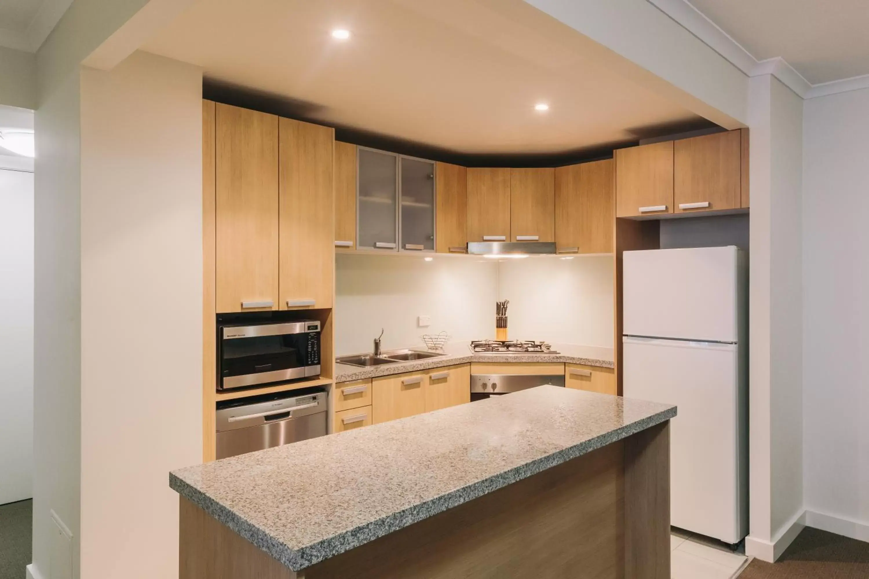 Kitchen or kitchenette, Kitchen/Kitchenette in Newcastle Central Plaza Apartment Hotel