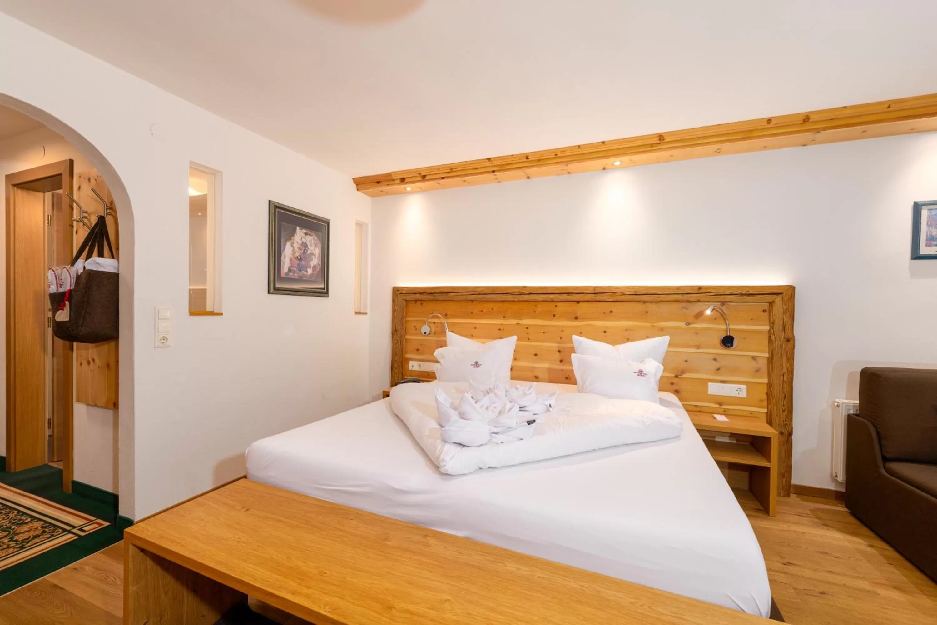 Bed in Hotel Schwarzer Adler