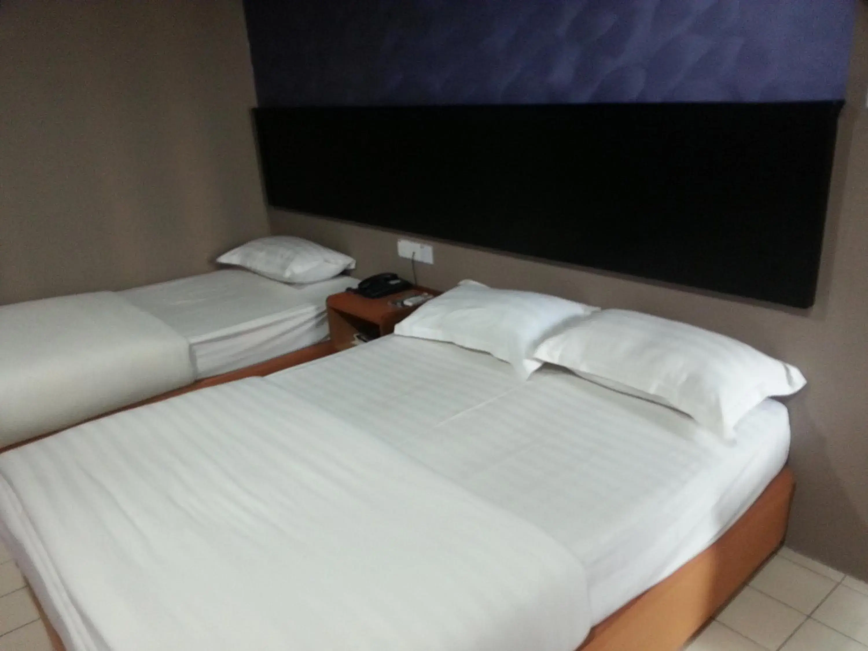 Bed in Oriental Inn