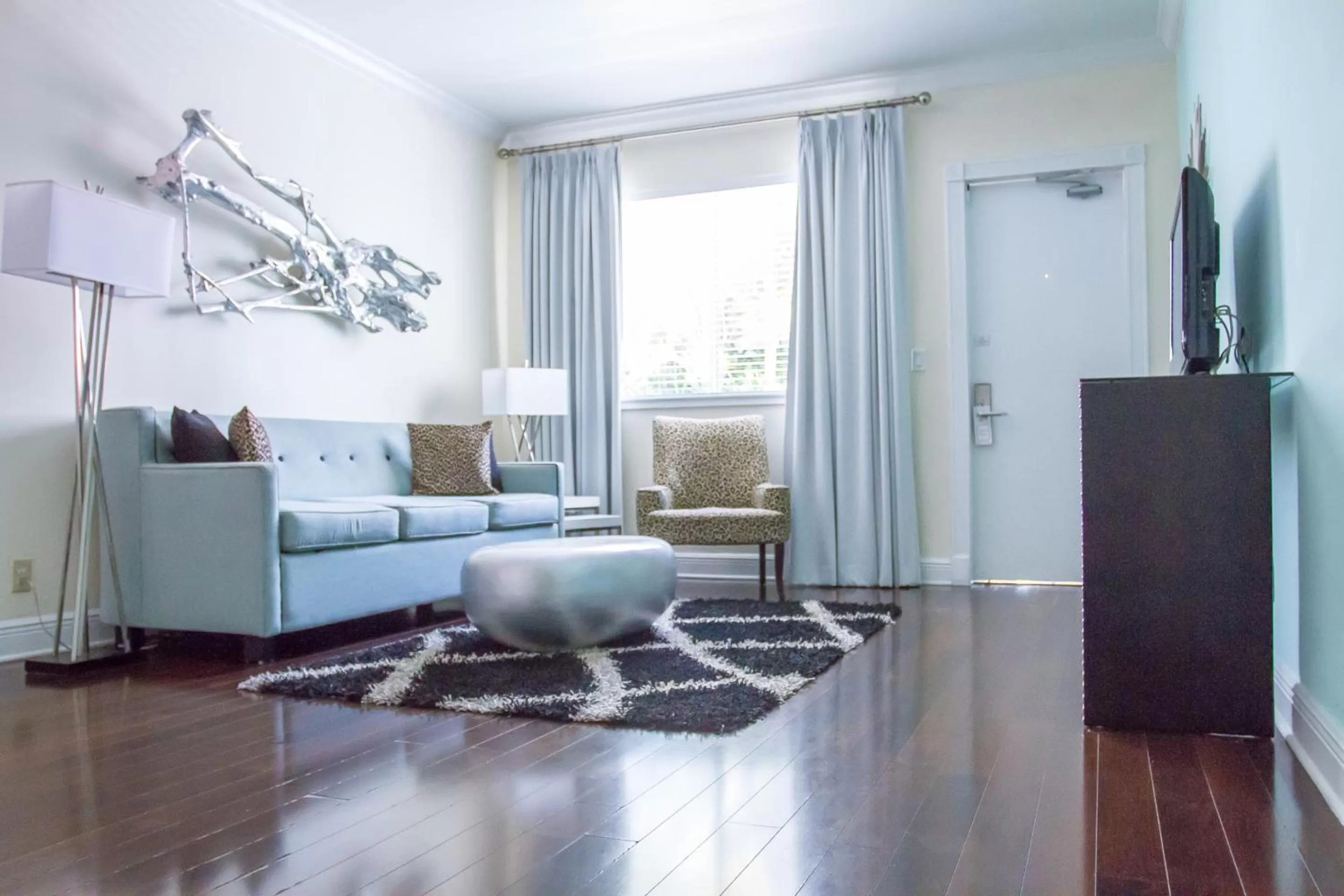 TV and multimedia in Dorchester Hotel & Suites