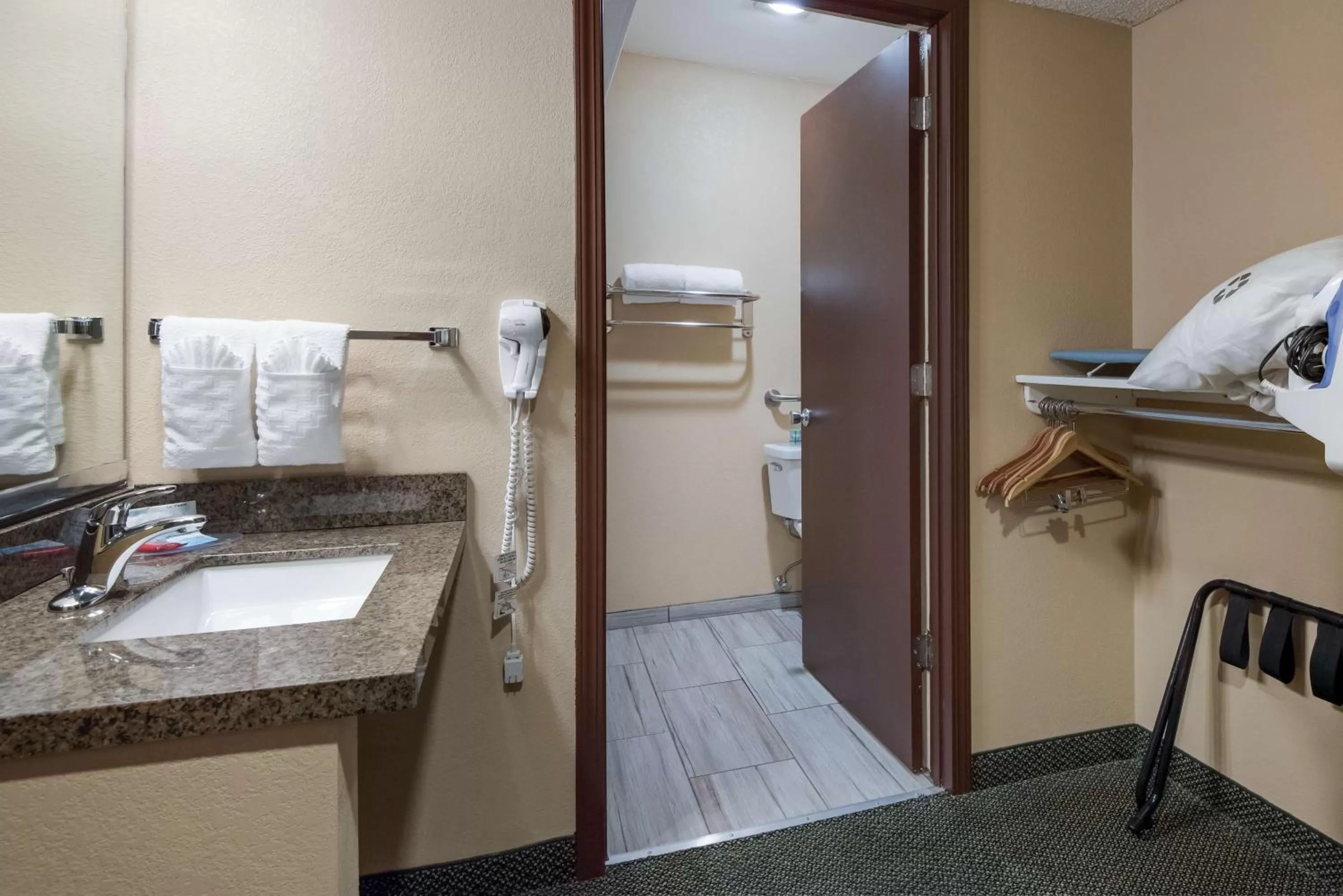 Bathroom, Bed in SureStay Plus Hotel by Best Western Reno Airport