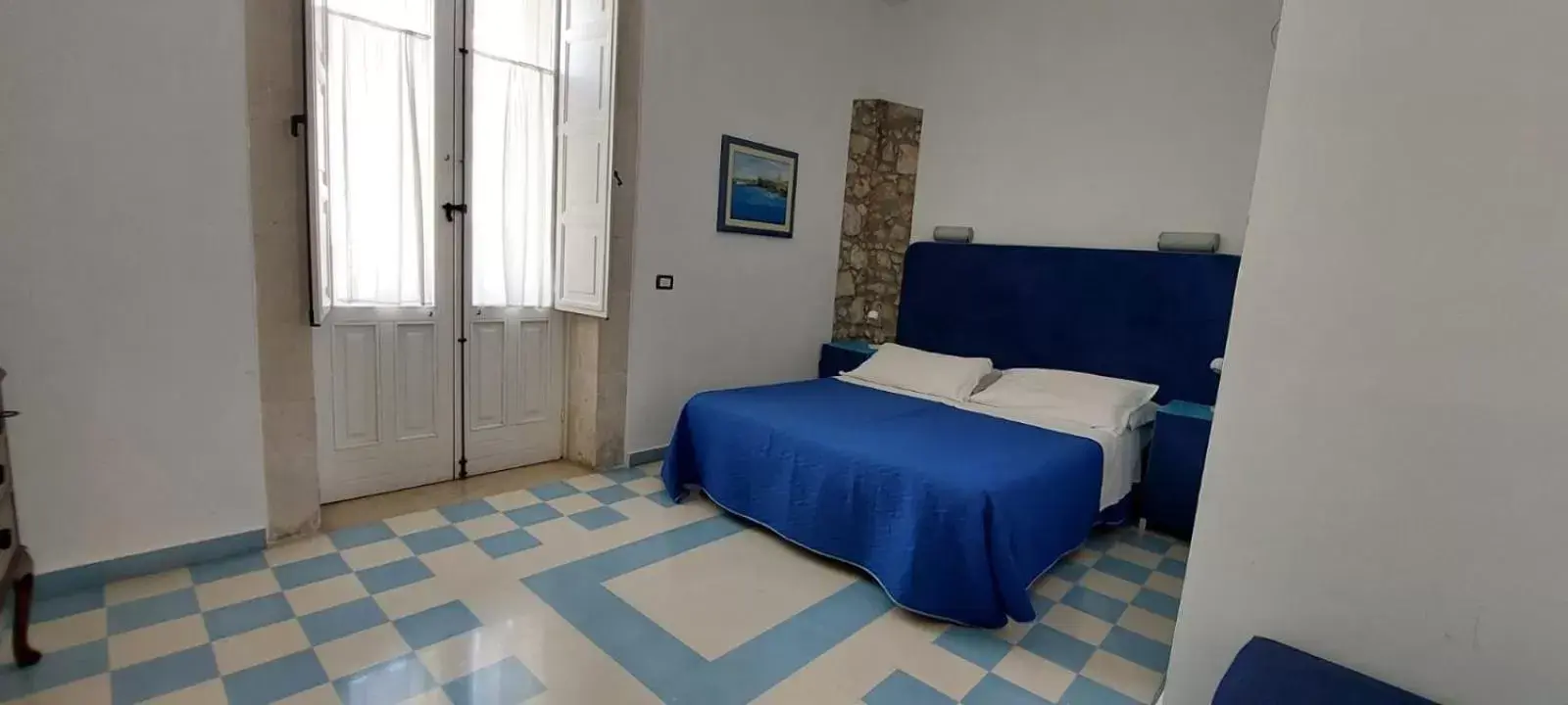 Bed in Lakkios charming suites and rooms