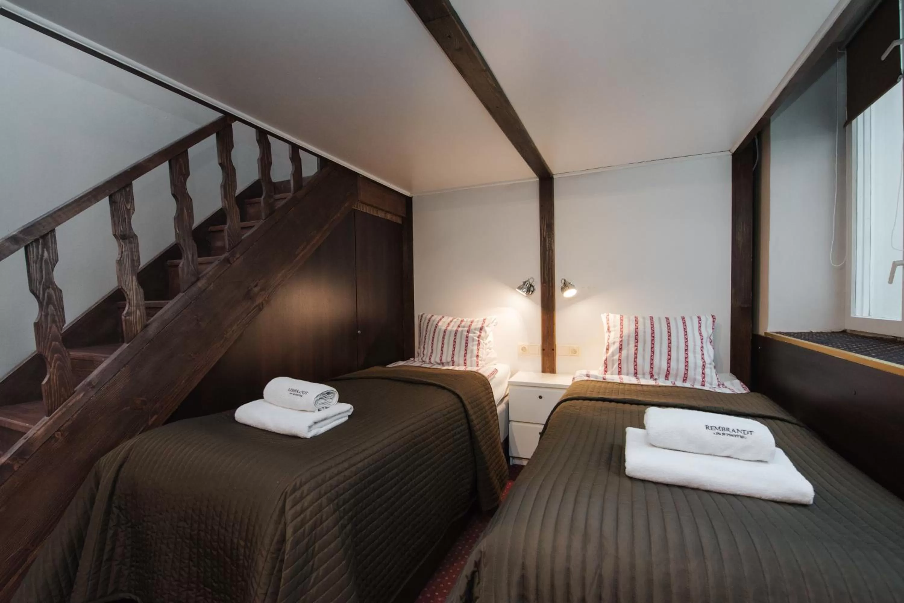 Bed in Rembrandt Aparthotel