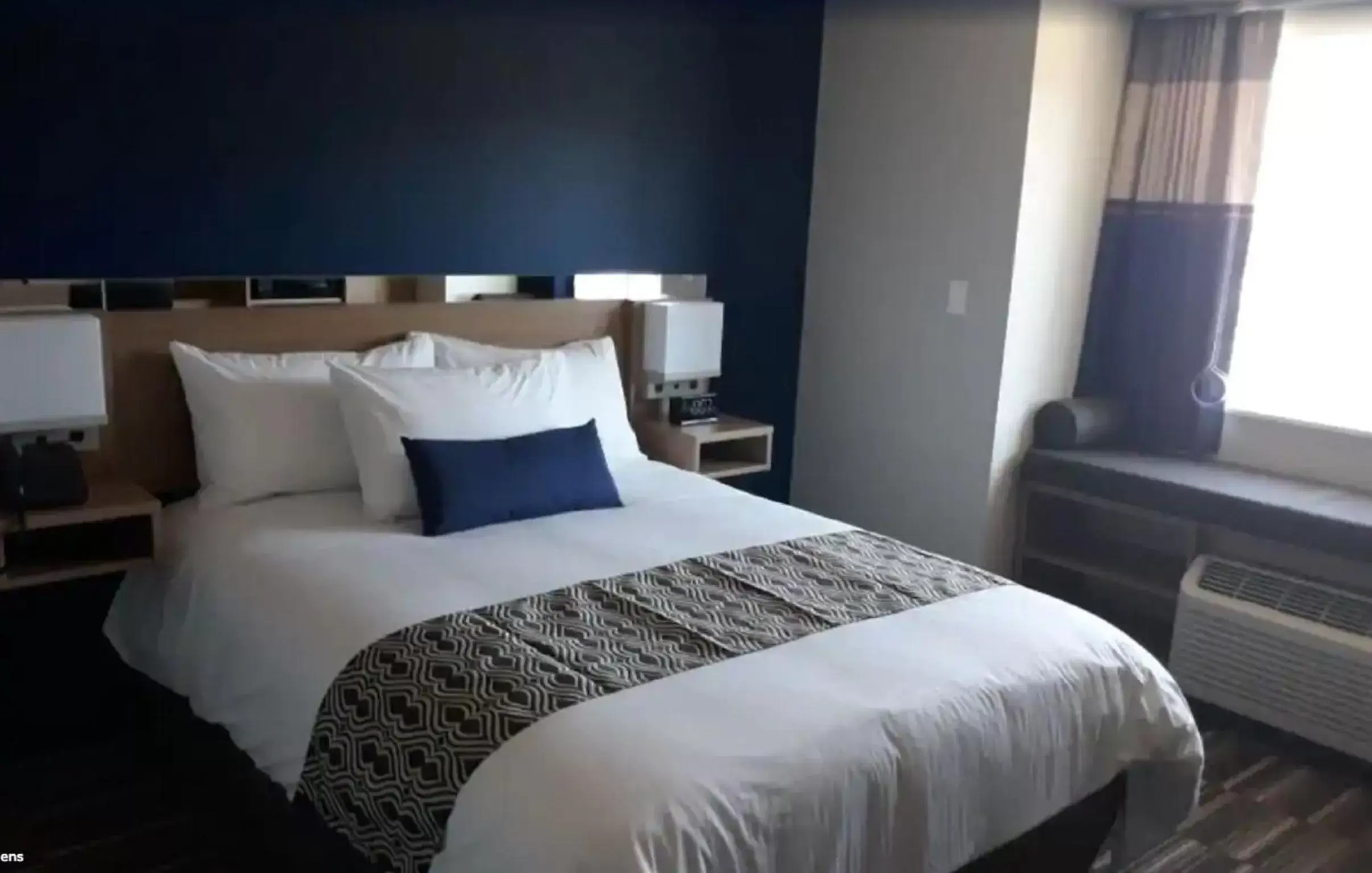 Bed in Microtel Inn & Suites by Wyndham Woodland Park