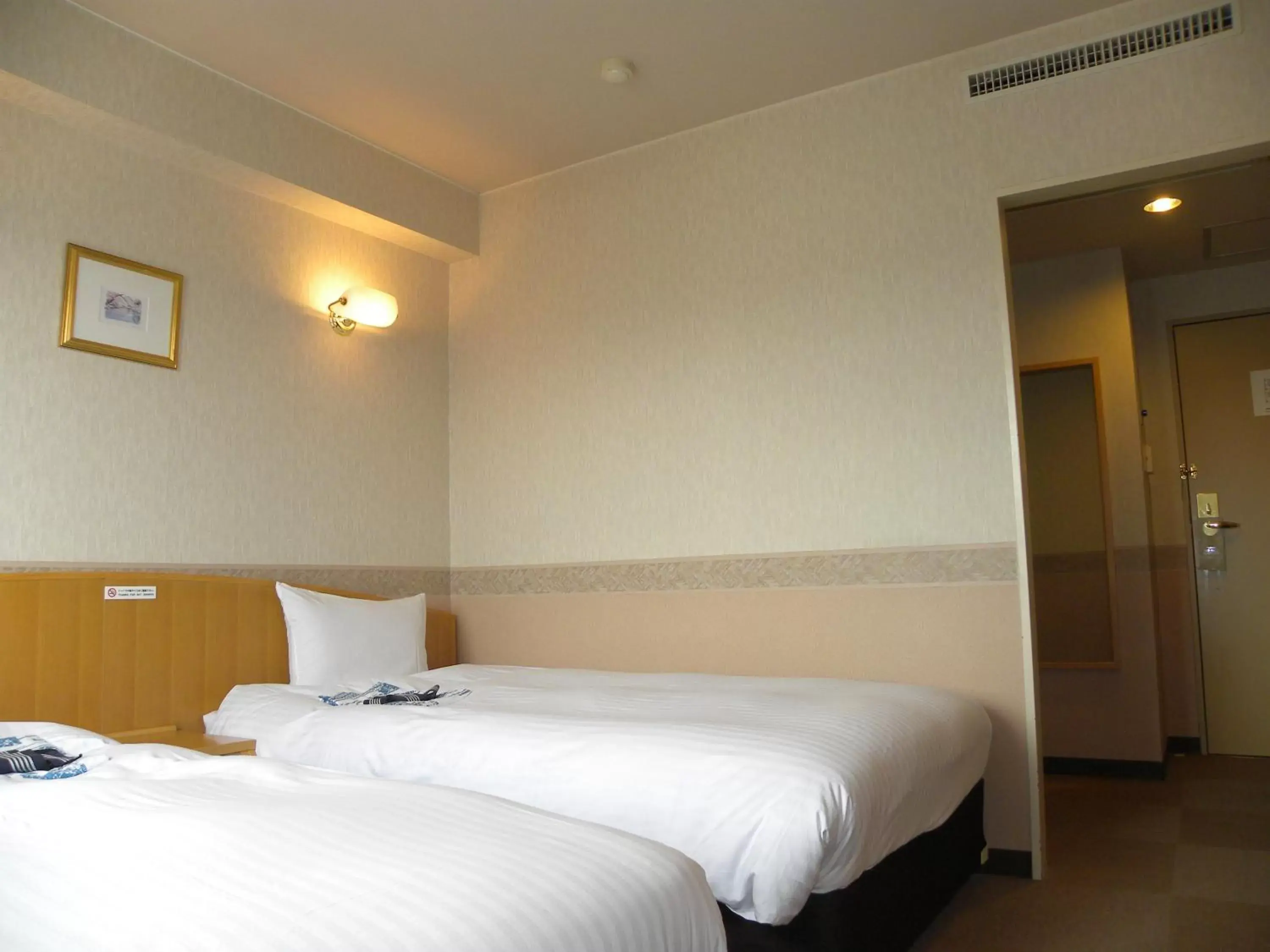 Photo of the whole room, Bed in Hotel Benex Yonezawa