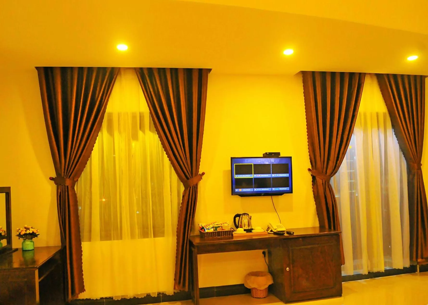 TV/Entertainment Center in Aries Hotel