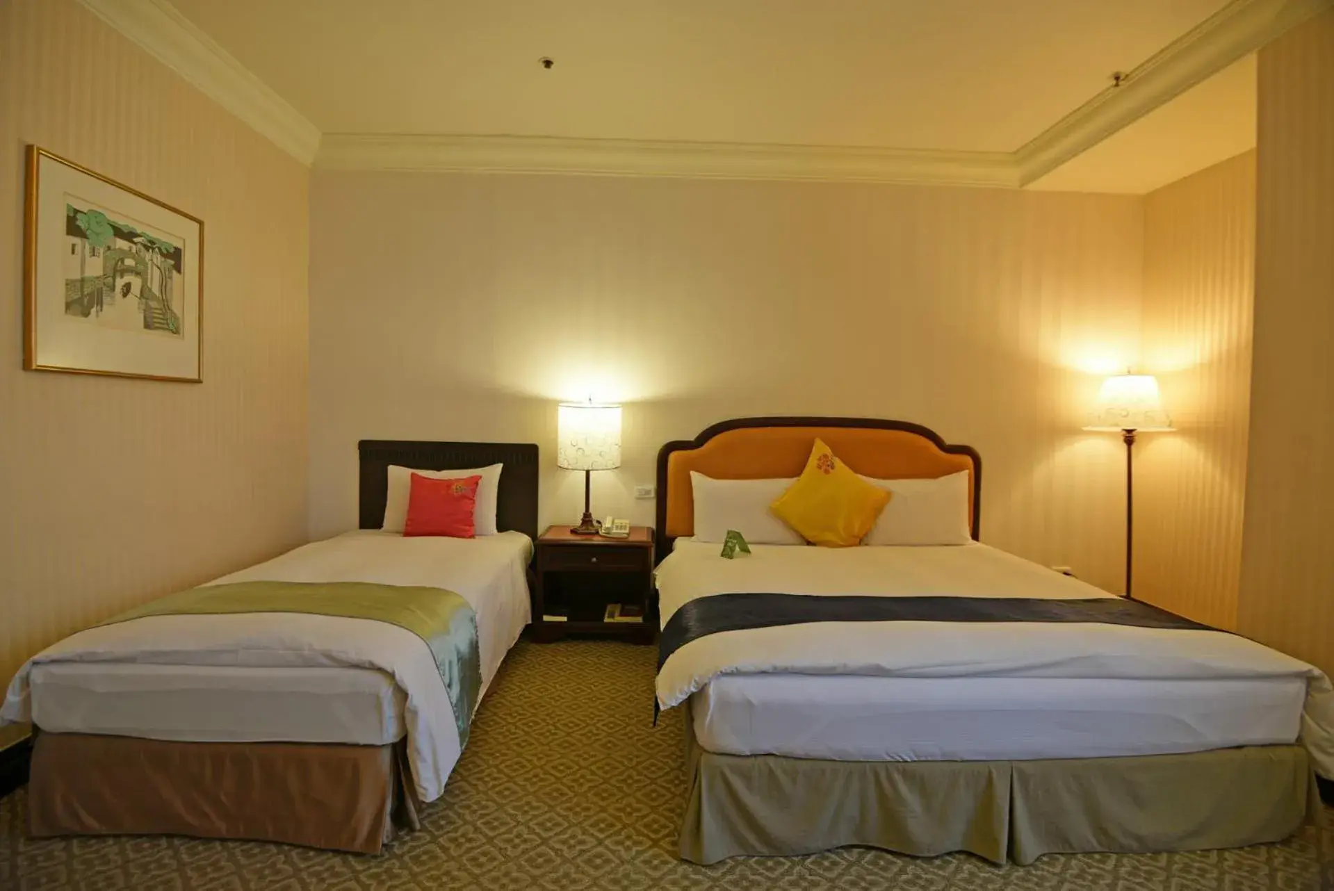 Bed in Wei-Yat Grand Hotel