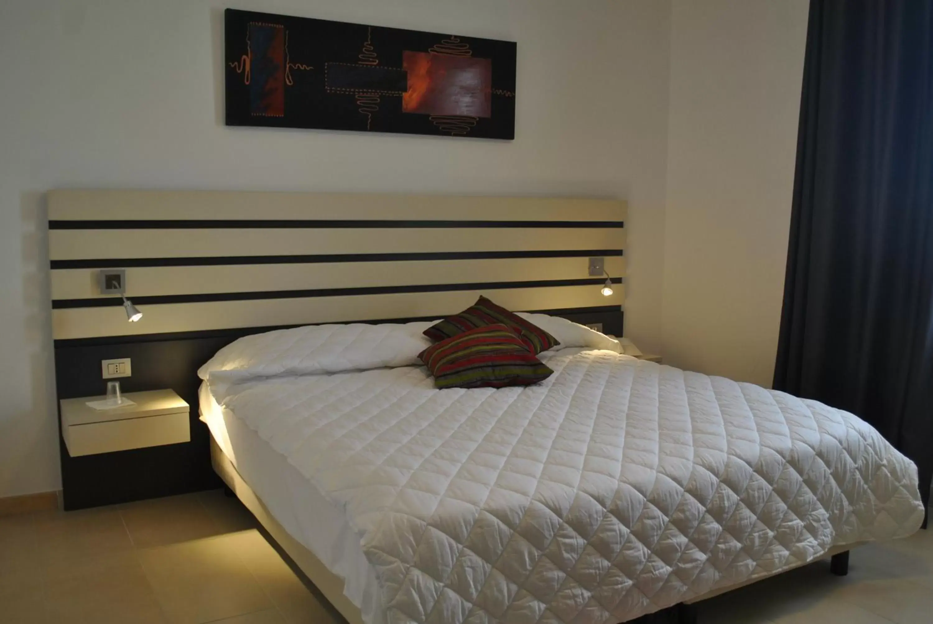 Bed in Althea Palace Hotel Bed in Althea Palace Hotel