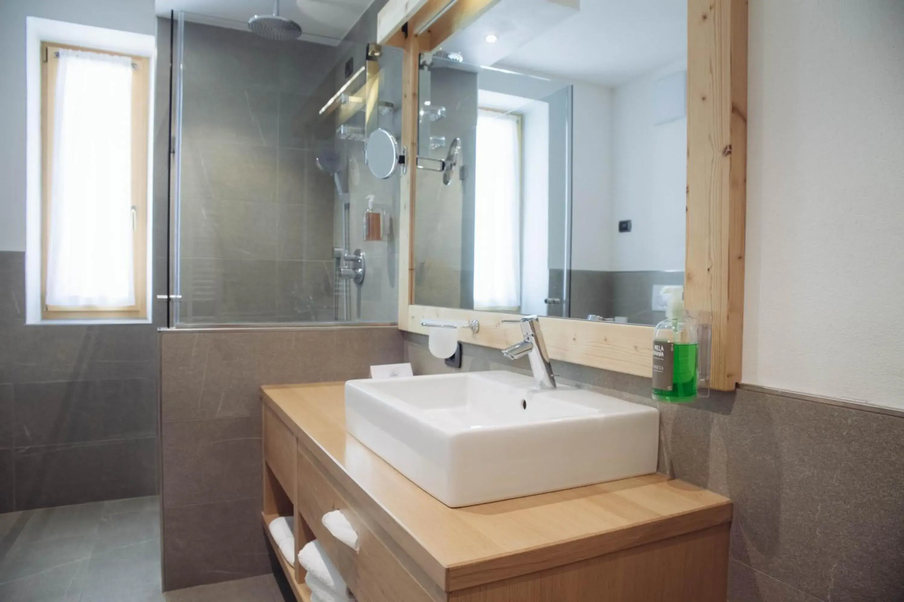 Bathroom in Pineta Nature Resort - Wellness & SPA