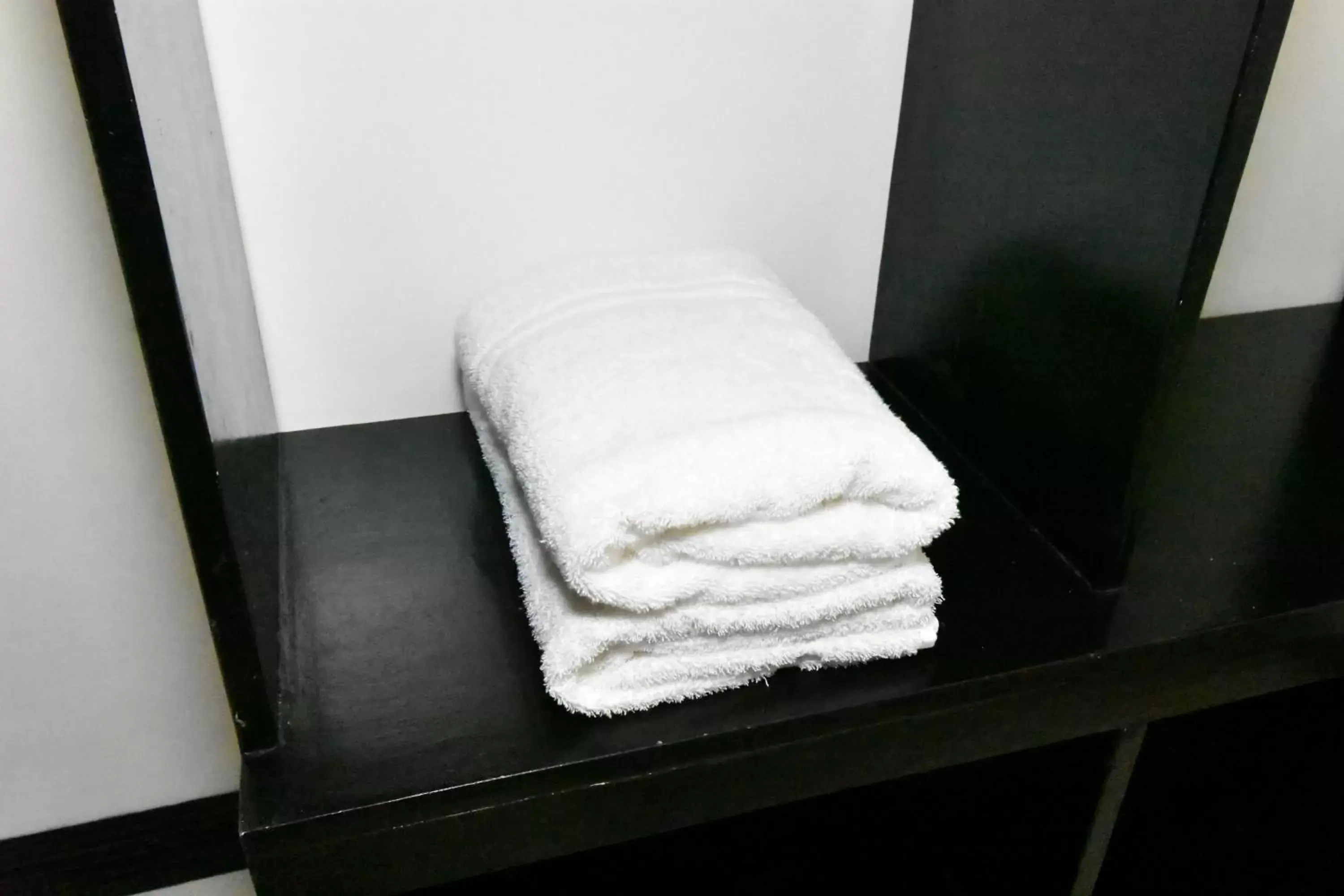 towels, Bed in Swiftlets Inn