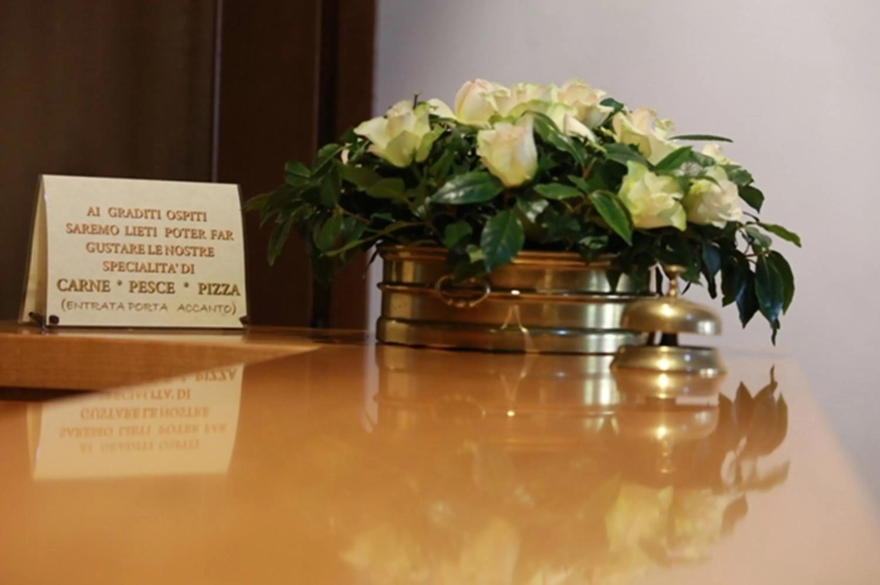 Communal lounge/ TV room in Hotel Al Posta