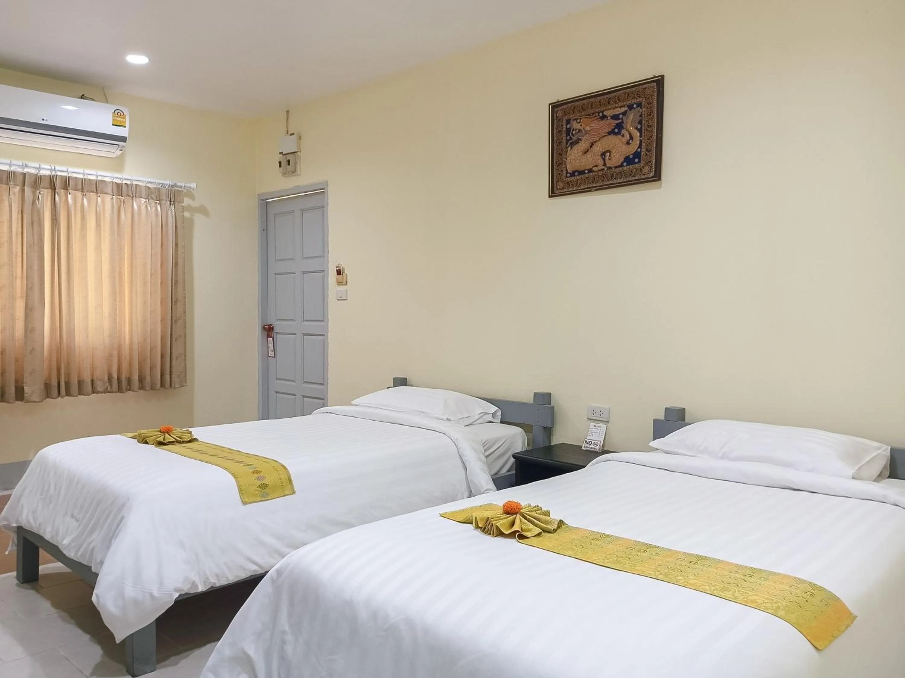 Bed in Silamanee Resort & Spa Hotel