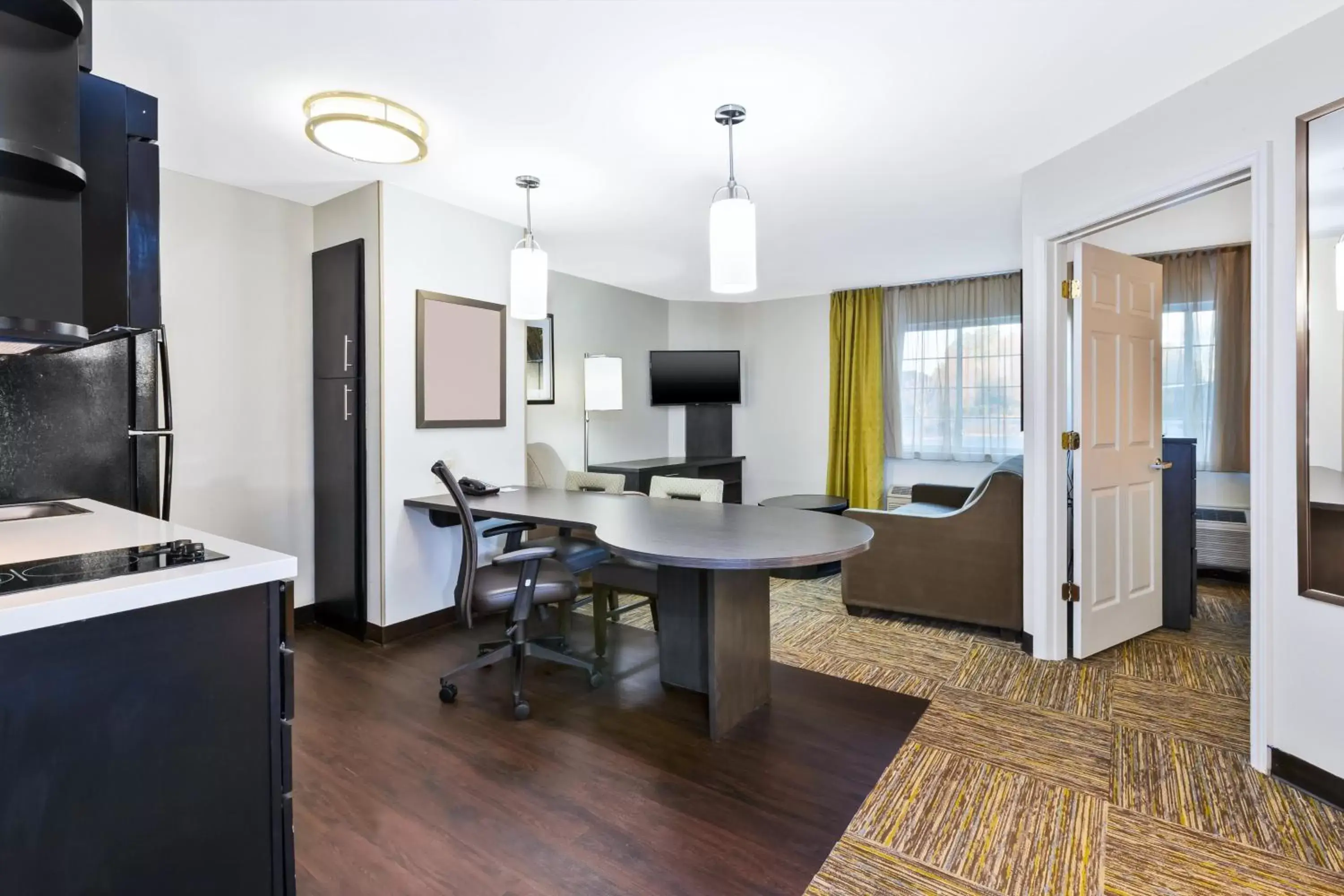 Photo of the whole room, Seating Area in Candlewood Suites Huntersville-Lake Norman Area, an IHG Hotel