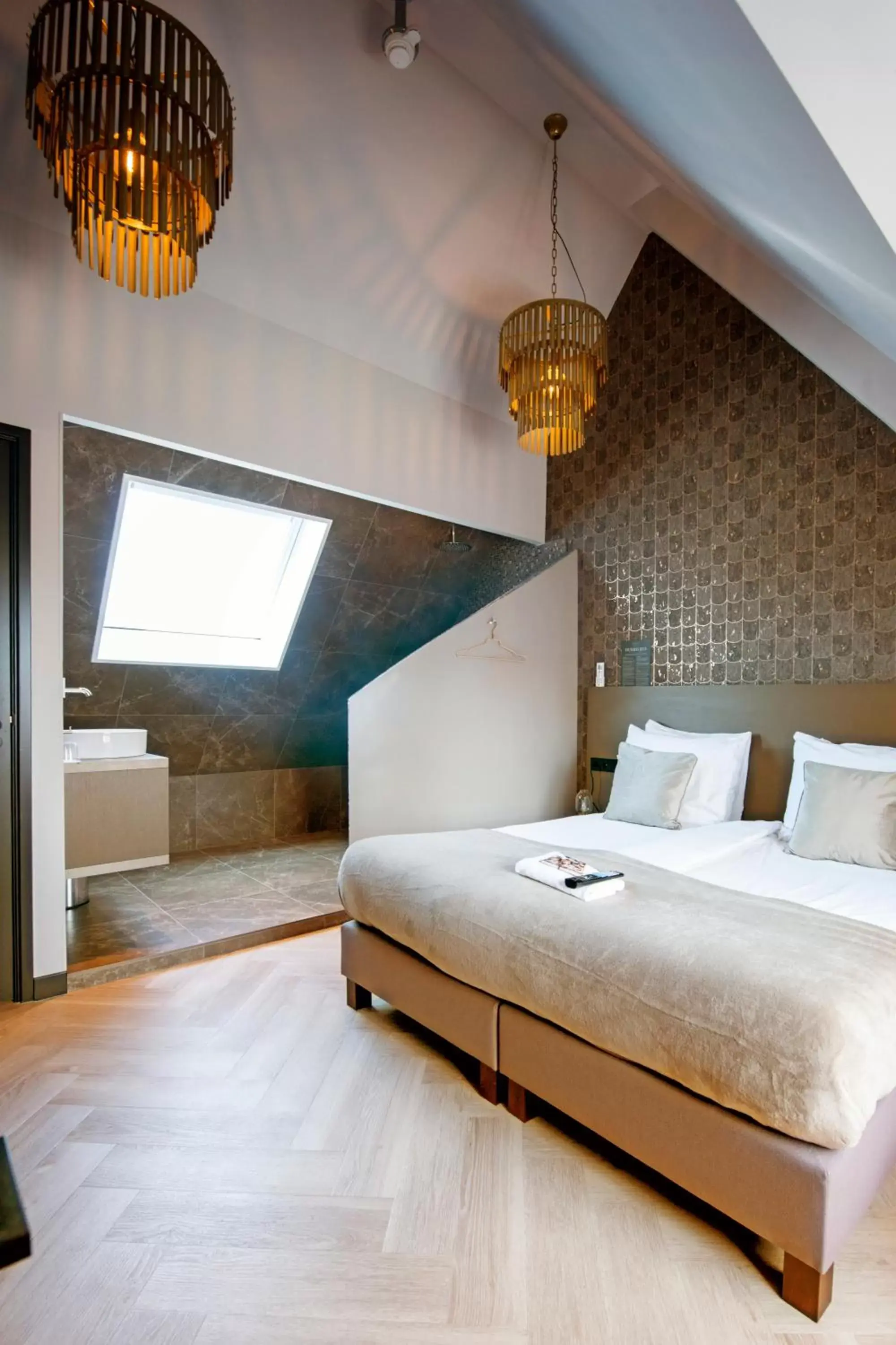 Bed in Harbour Suites Boutique Hotel