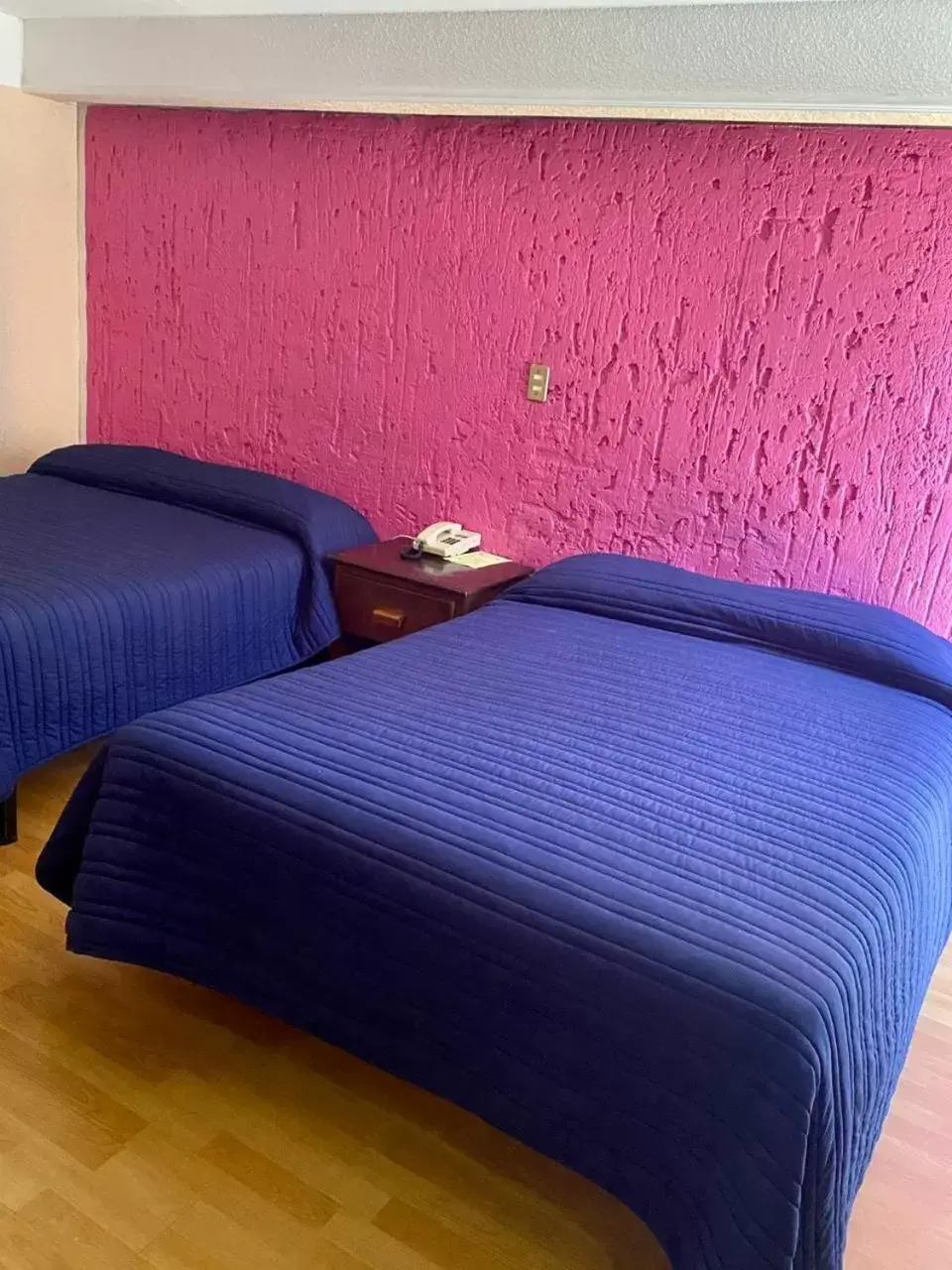 Bed in Hotel Zacatecas Courts