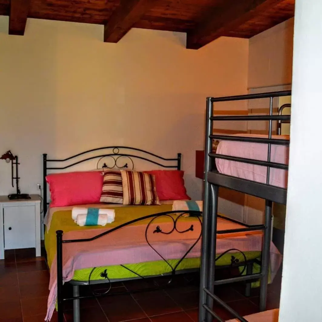 Bed in B&B Le Anthos