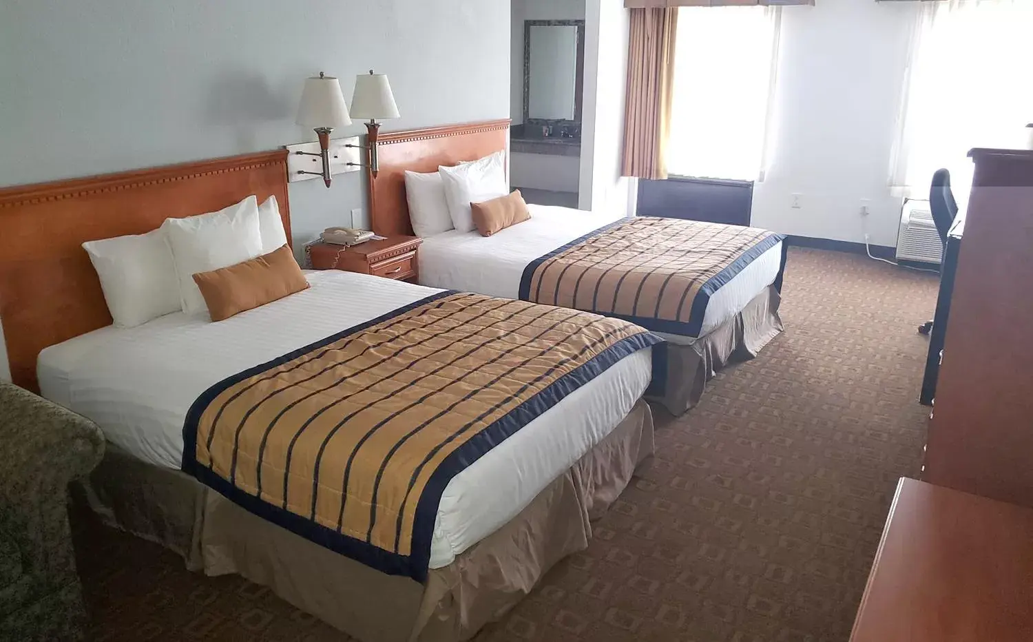 Bed in Coratel Inn & Suites by Jasper New Braunfels IH-35 EXT 189