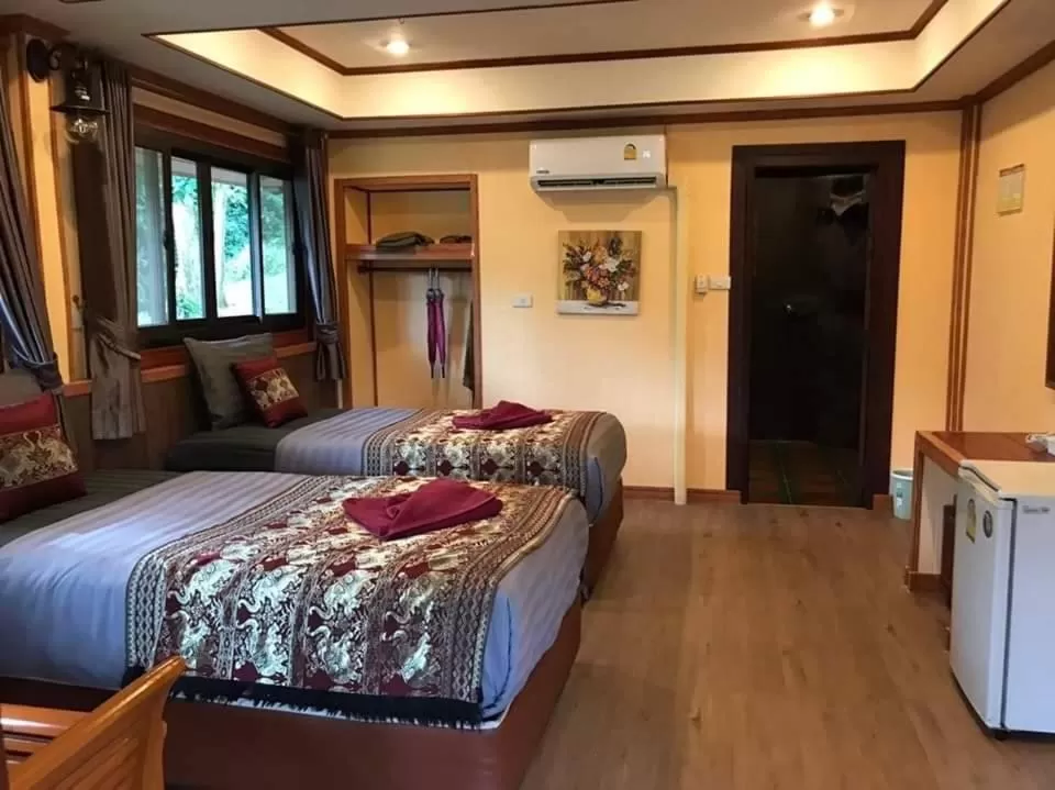 Bed in Khaosok Rainforest Resort