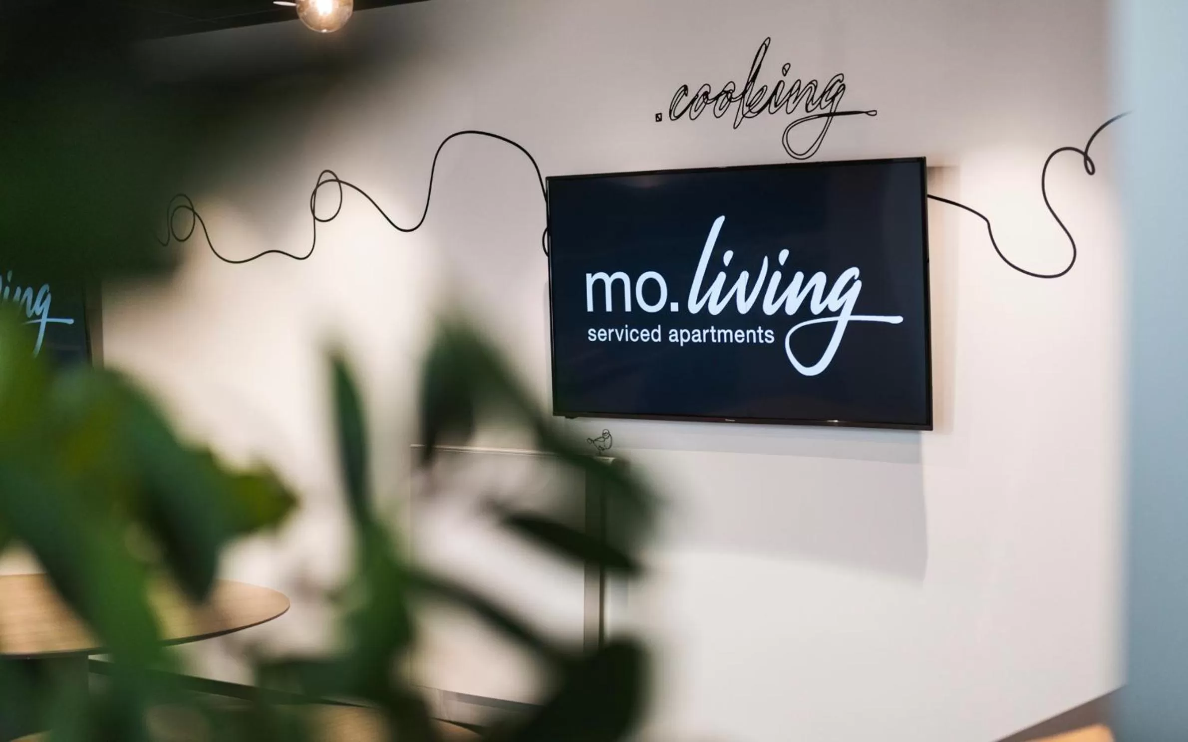 Property logo or sign in MoLiving - Design Hotel & Apartments Düsseldorf-Neuss